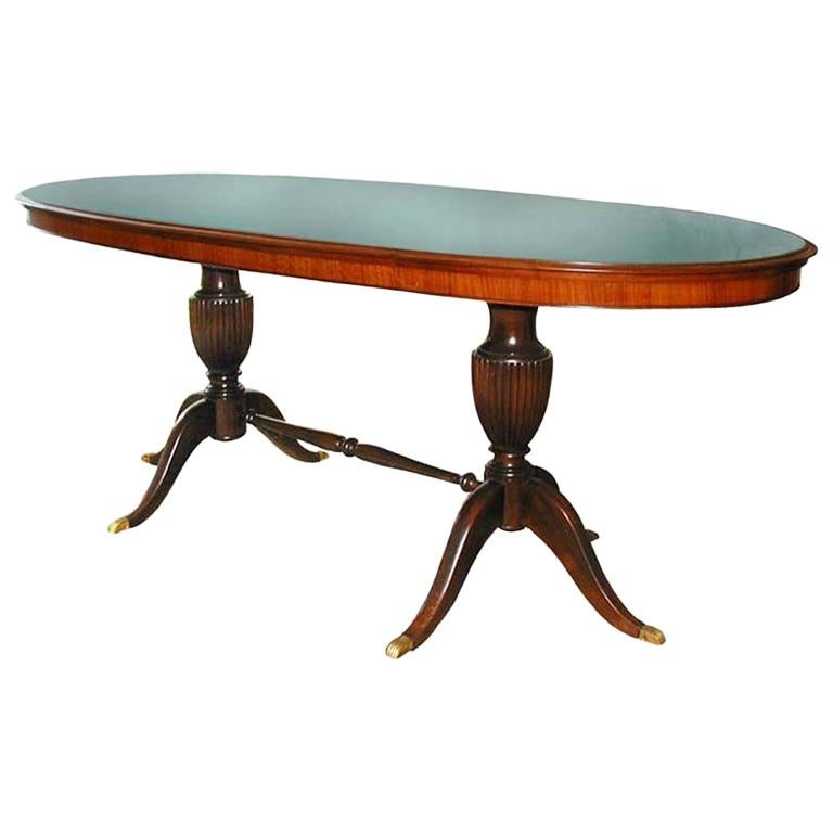 Table de salle à manger italienne des années 1950 en palissandre ovale avec plateau en verre vert