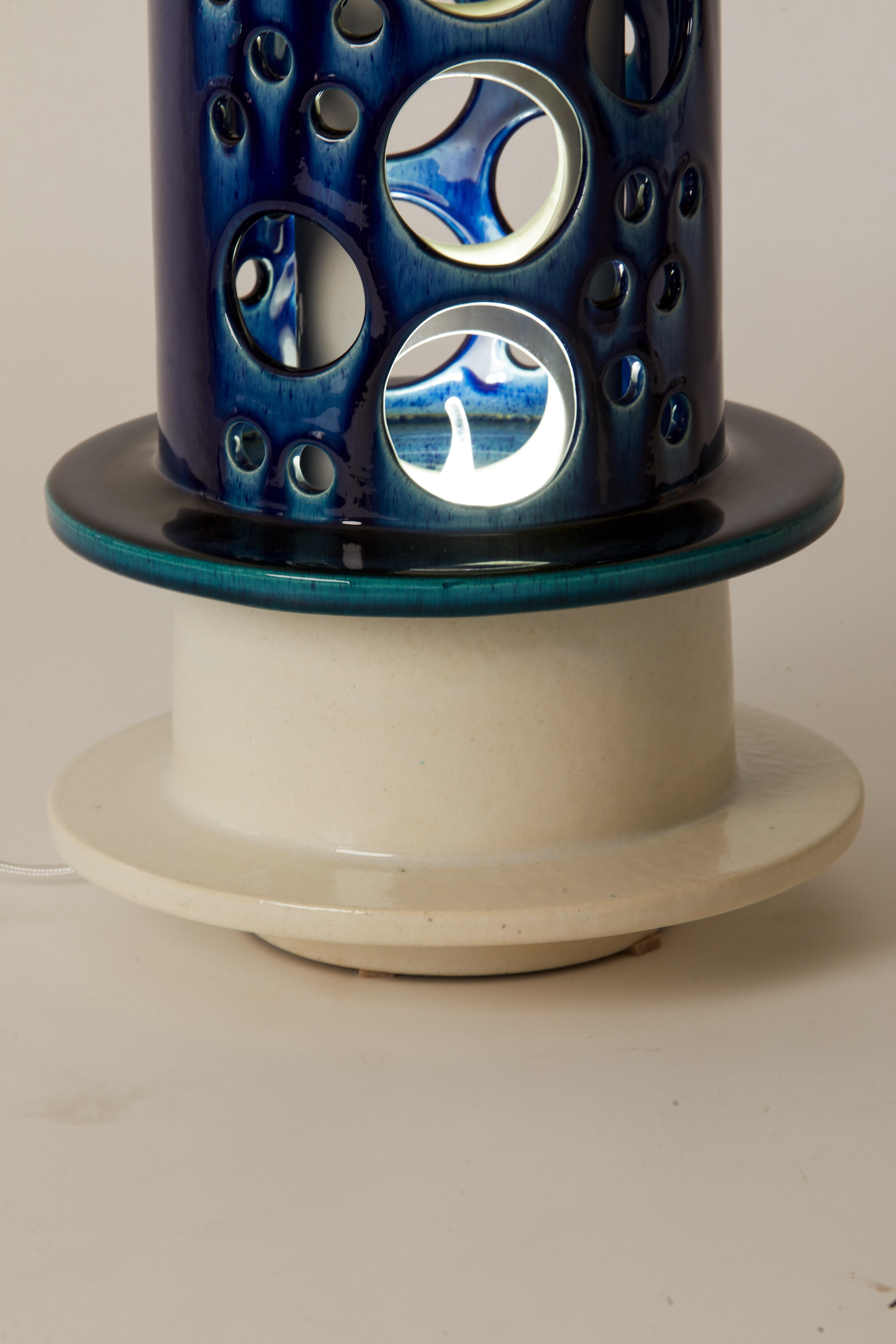 1950s Italian Pair of Blue and White Pottery Lamps with Circular Cutout Design  In Good Condition In Aspen, CO