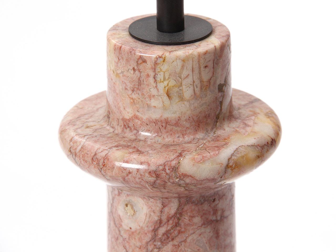 A table lamp with a lathe-turned pink marble base. Measures: Base height 20.25