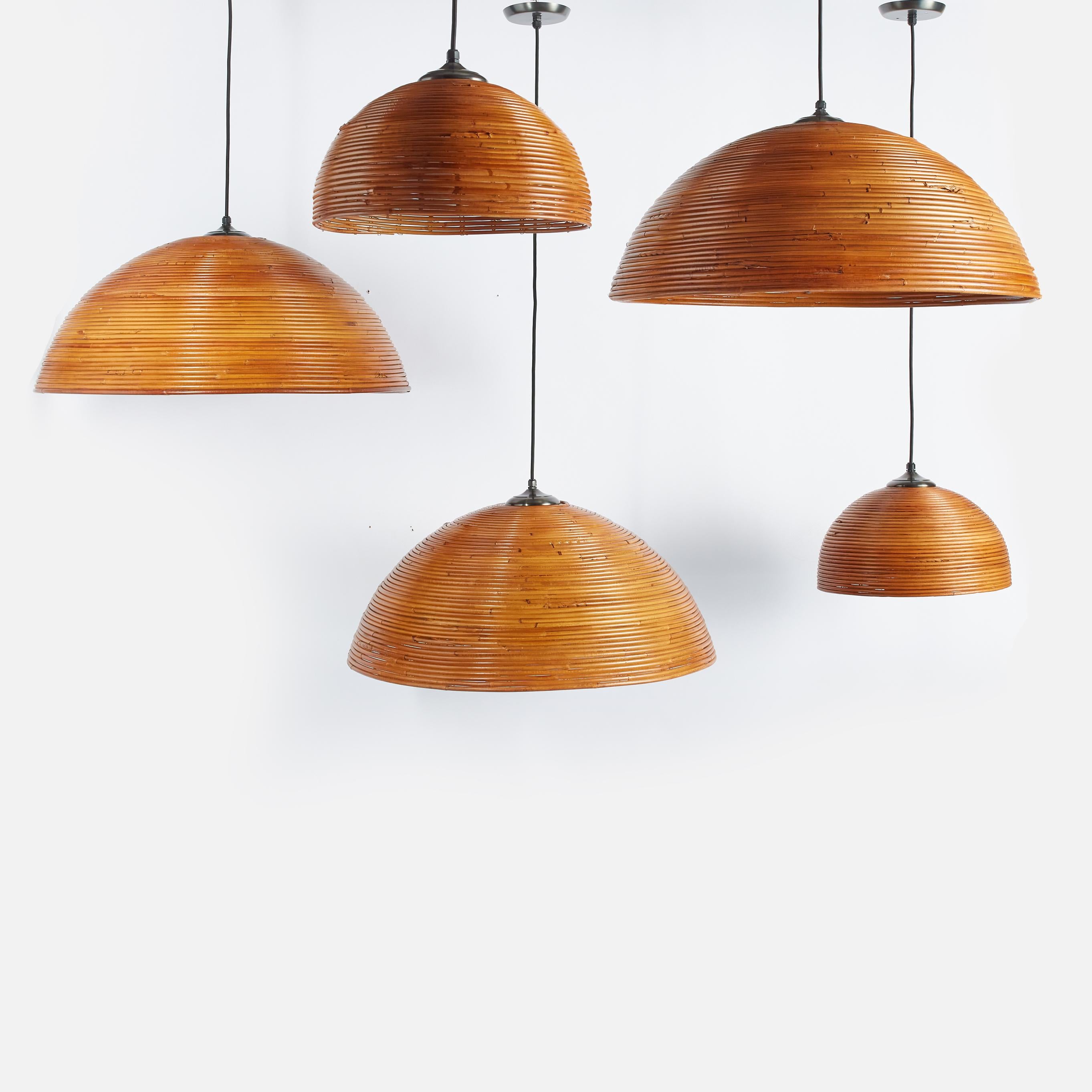 Wonderful dome shaped bamboo chandelier pendant in the style of Gabriela Crespi. 

Newly rewired with black silk cord and oil rubbed bronze hardware & ceiling plate. 

Two Sizes available.

Sold Individually. 

Small Dimensions: 15