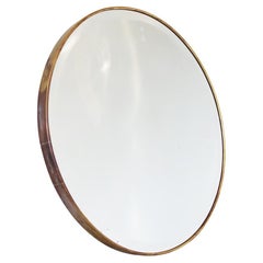 Miroir biseauté rond italien des années 1950 avec cadre en laiton