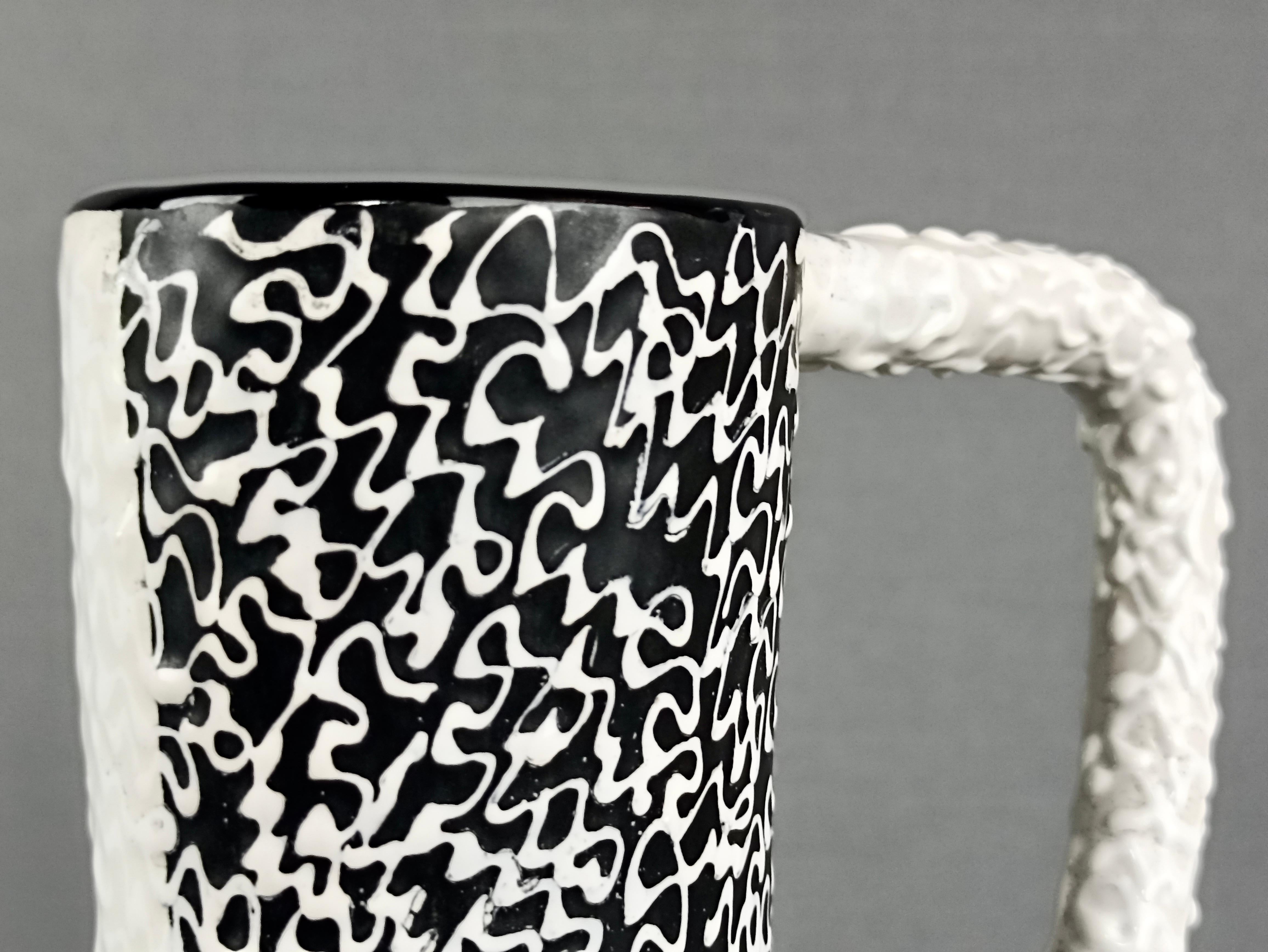 Hand-Crafted 1950s Italian Santucci Deruta asymmetrical black and white ceramic vase. For Sale