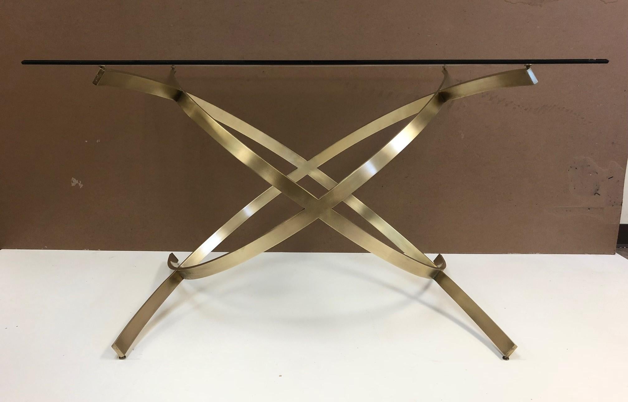 1950s Italian sculptural solid brass dining table with glass top.