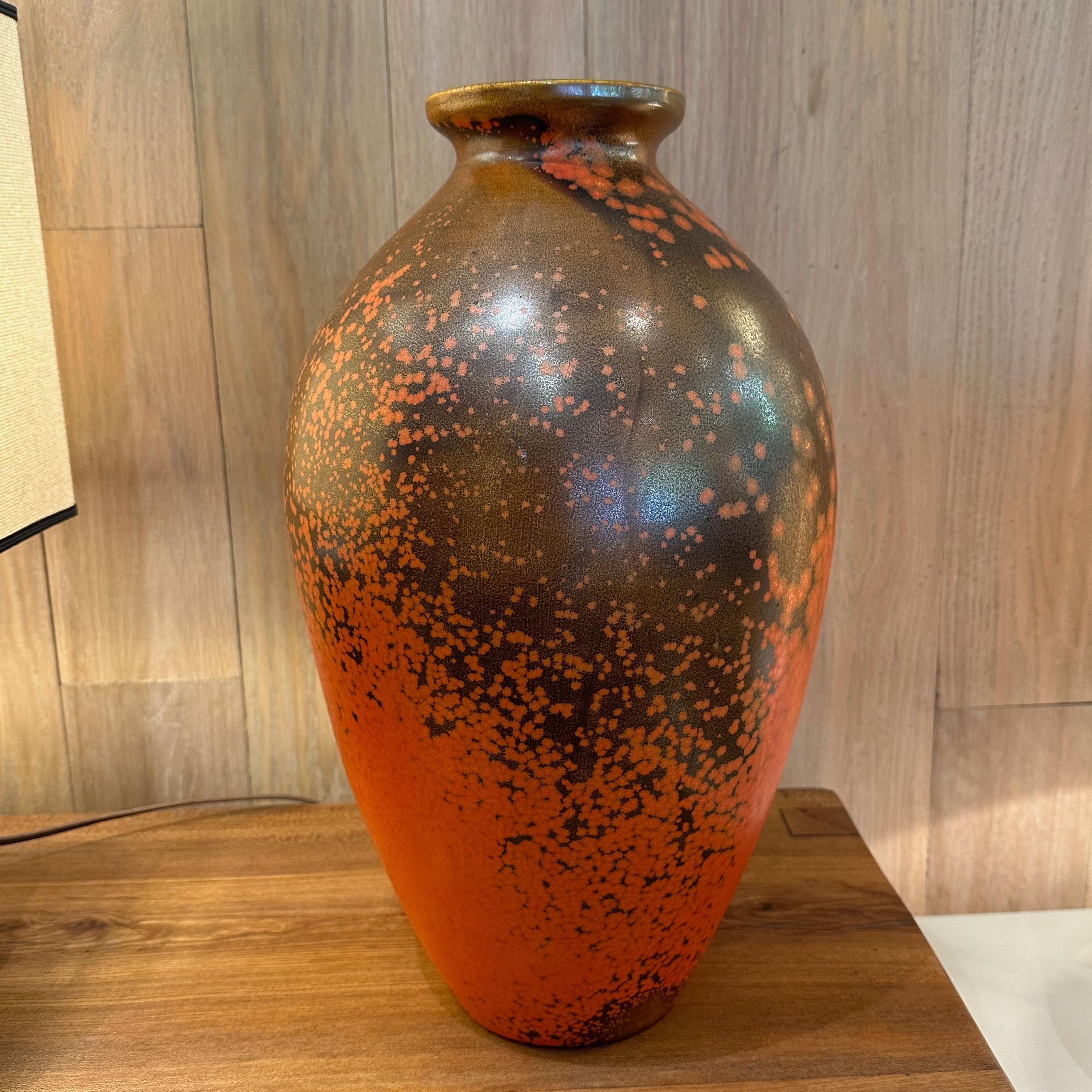 Beautiful orange and brown ceramic vase.
1950s Italian signed Guido Andlovlz large scale vase.