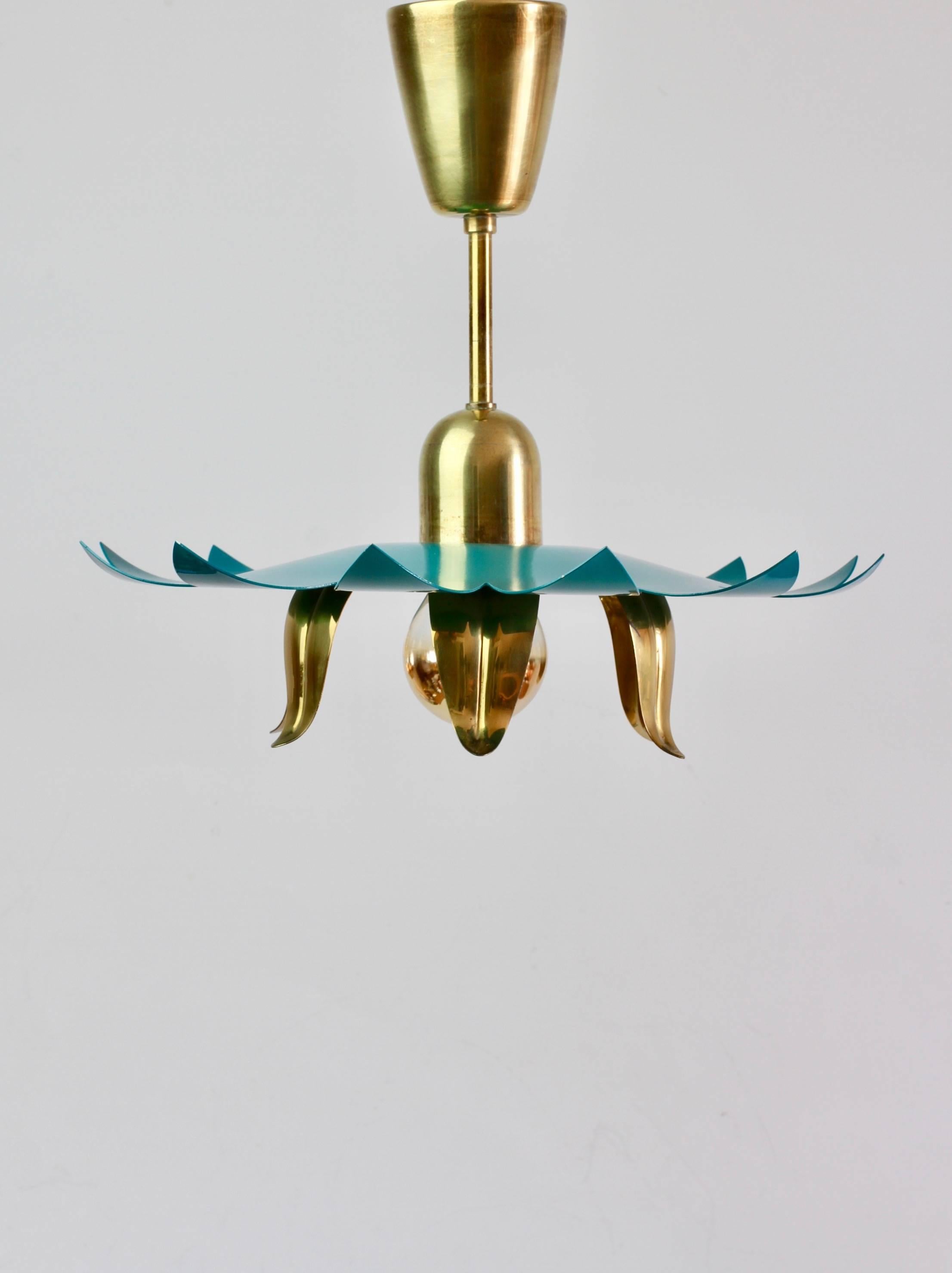 Wonderful, whimsical and fun 1950s pendant light attributed to/in the style of midcentury Italian lighting design firm Stilnovo. Made of polished brass with a slight patina to it and featuring a turquoise colored 