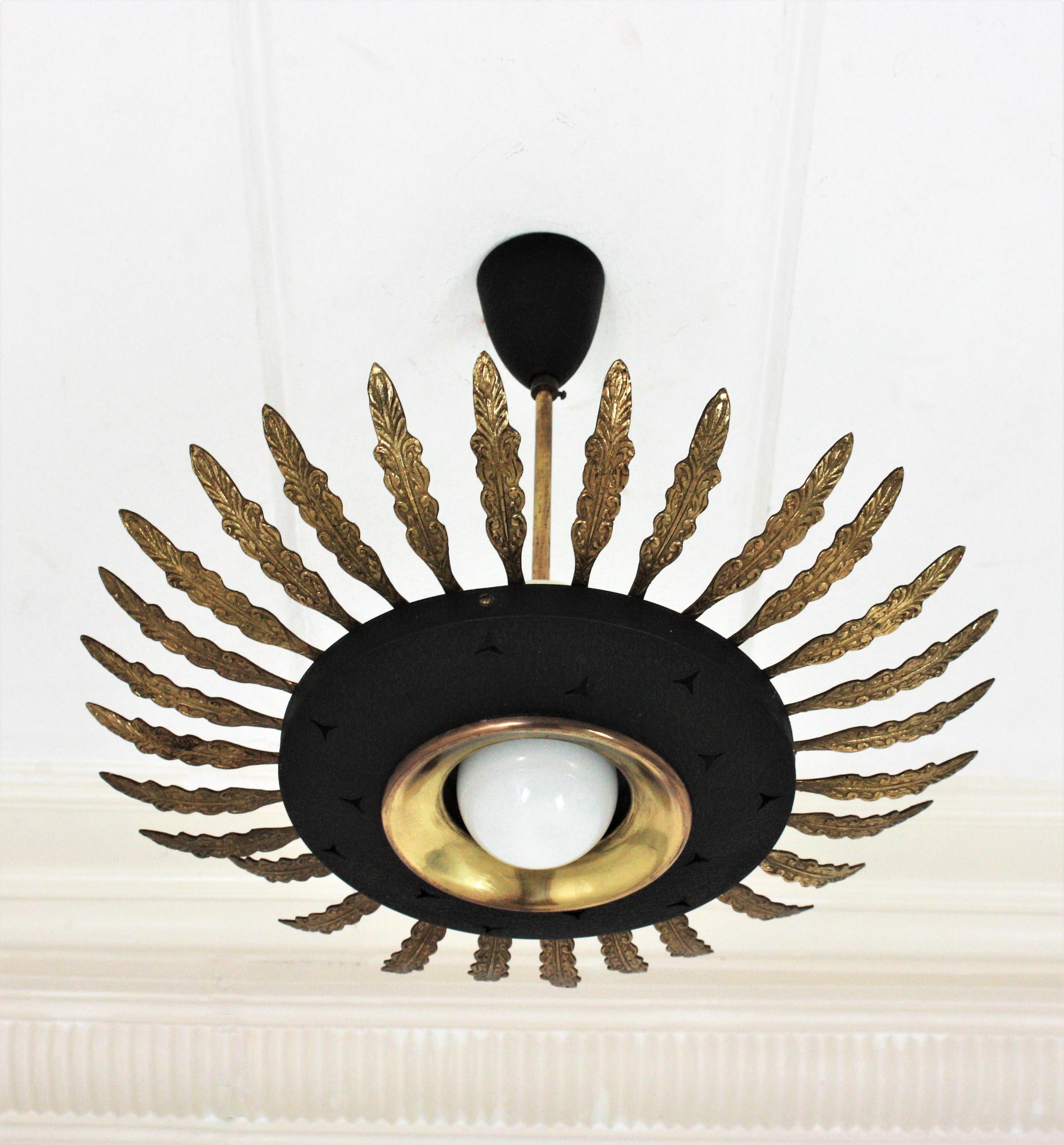 Mid-Century Modern Italian Sunburst Pendant / Flush Mount in Black Metal and Brass For Sale