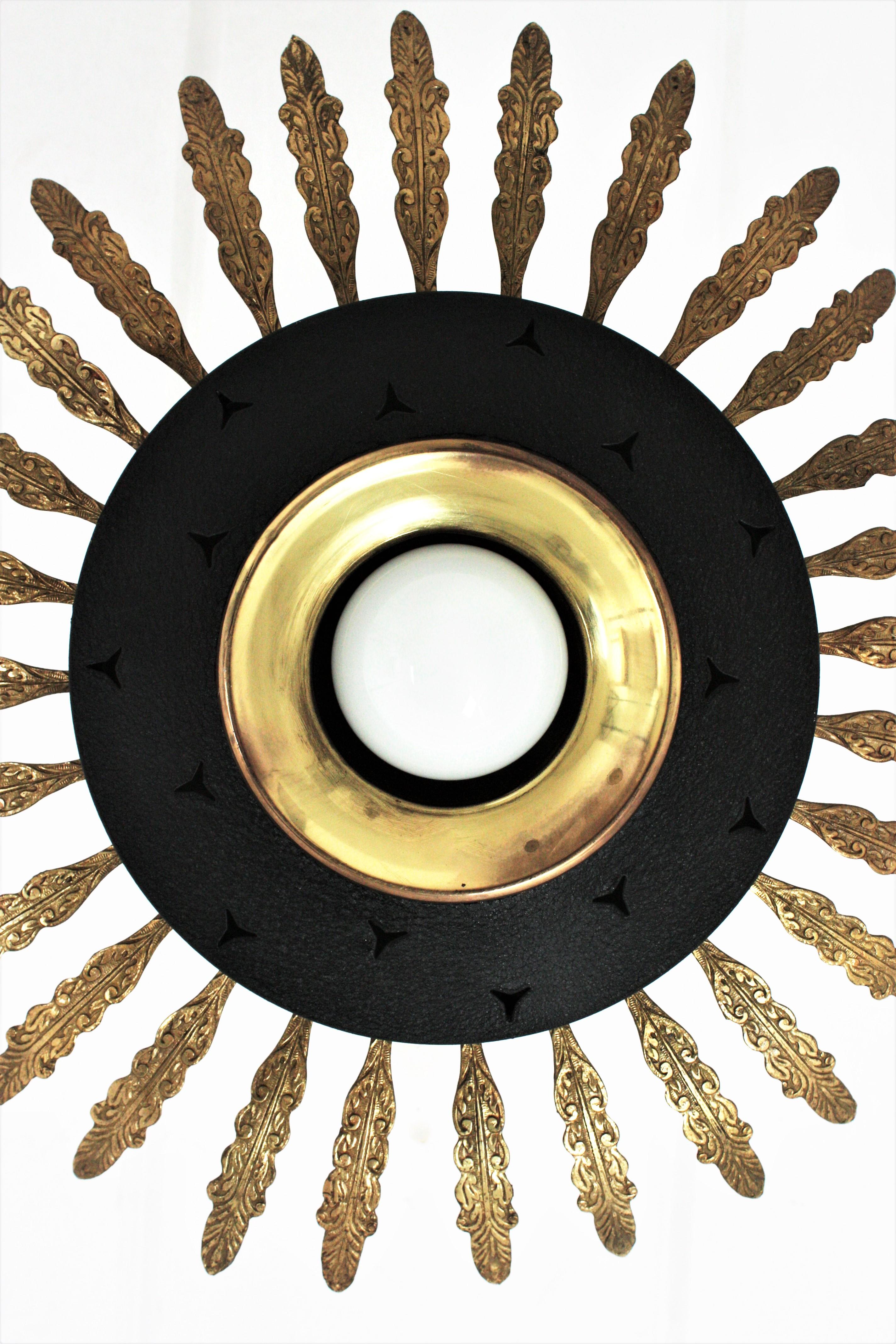 Lacquered Italian Sunburst Pendant / Flush Mount in Black Metal and Brass For Sale