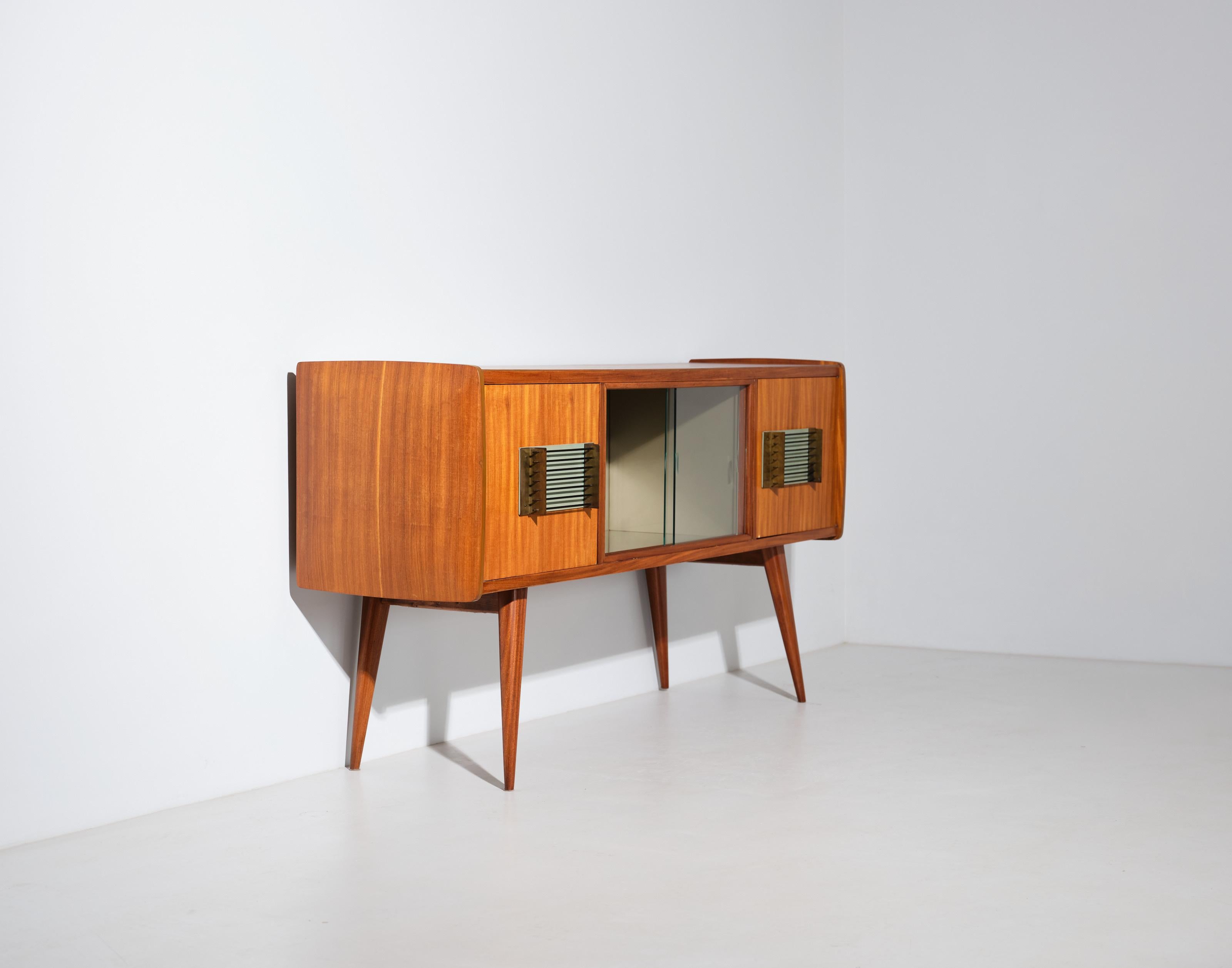 Mid-Century Modern 1950s Italian Teak Credenza with Bar : Refined Design, Glass Doors, and Brass For Sale