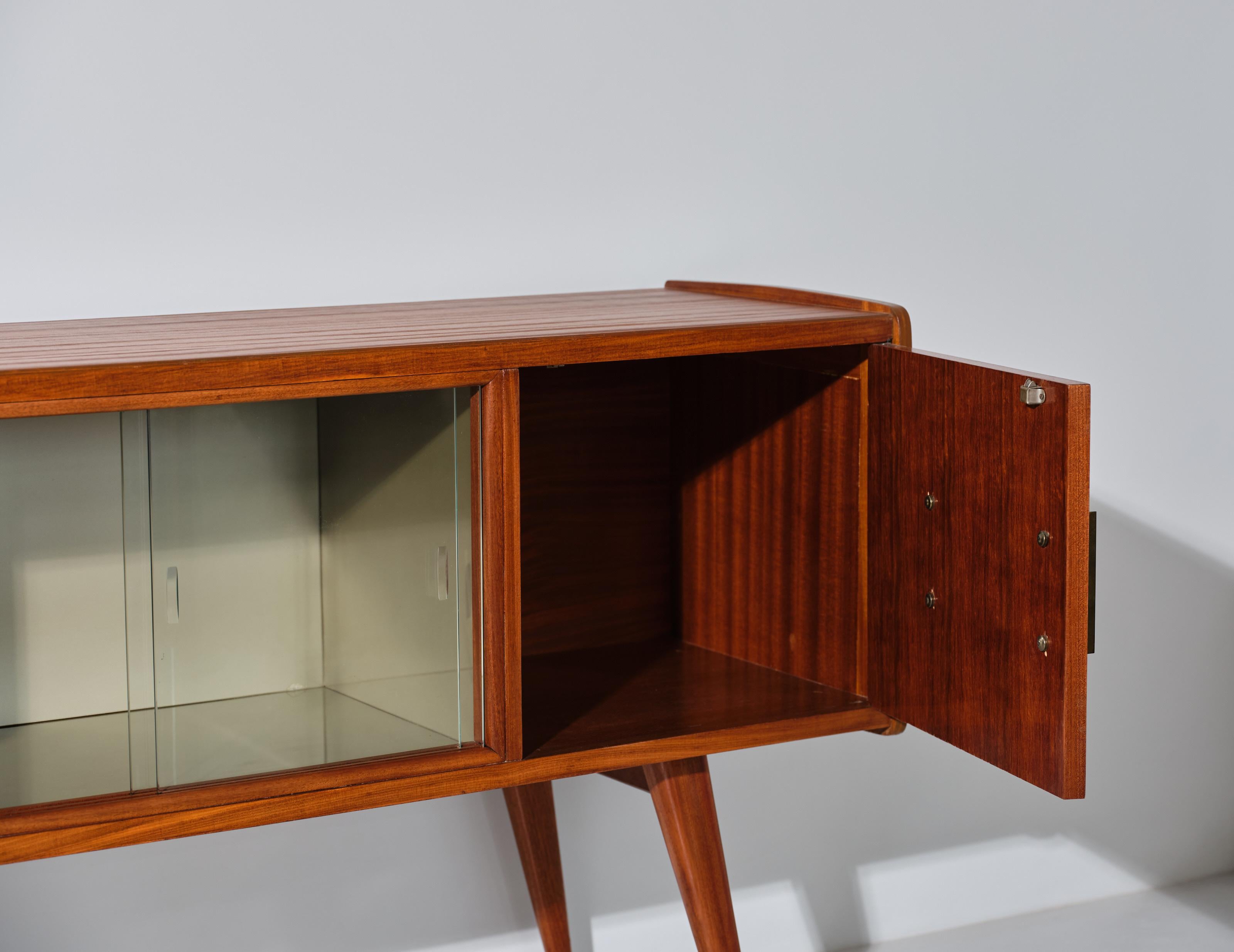 1950s Italian Teak Credenza with Bar : Refined Design, Glass Doors, and Brass For Sale 1