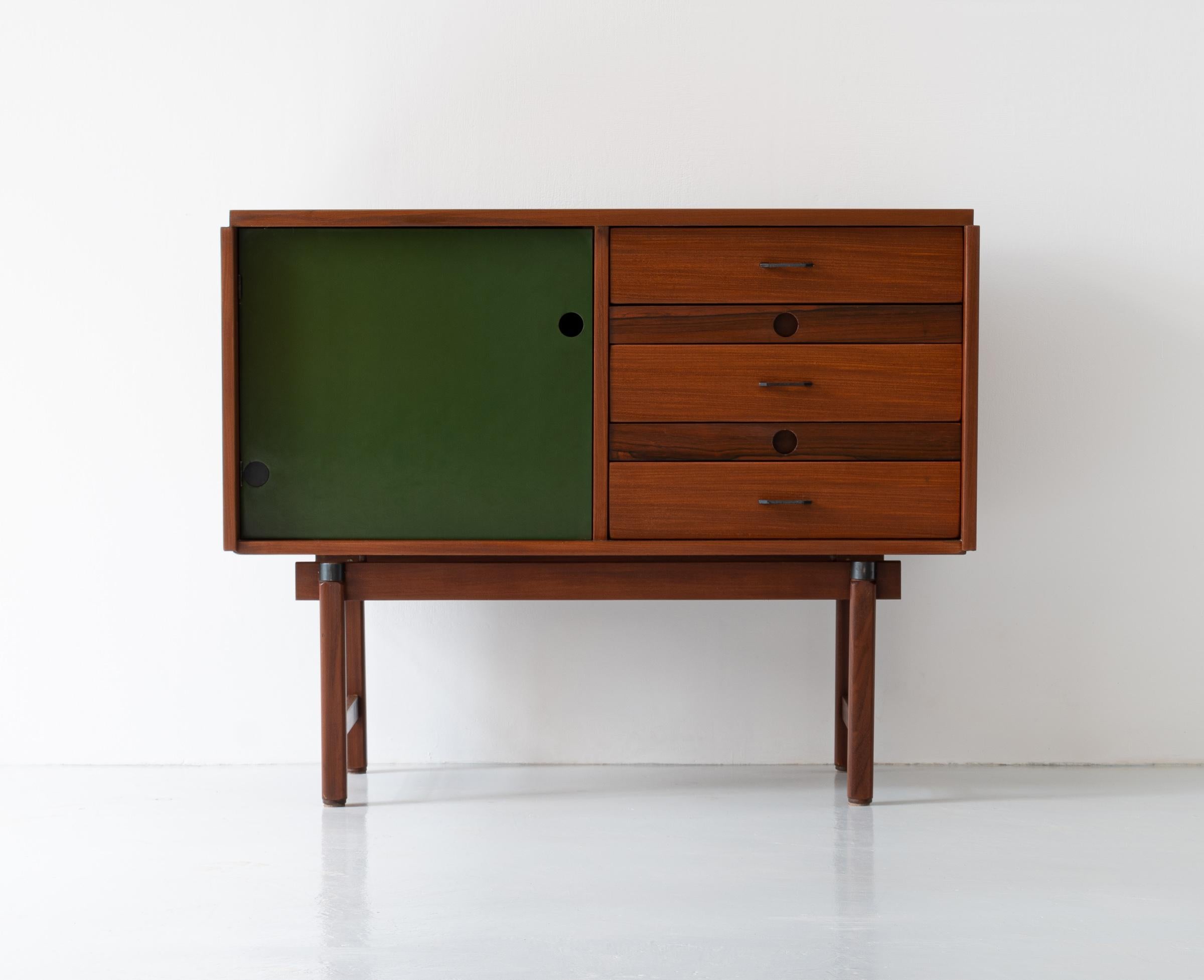 A small sideboard of Italian manufacture, designed and produced in the 1950s.

Fully restored: complete sanding of the original finish, new glued and added structural parts, geometric realignment, new shellac finish, new shellac green lacquer.