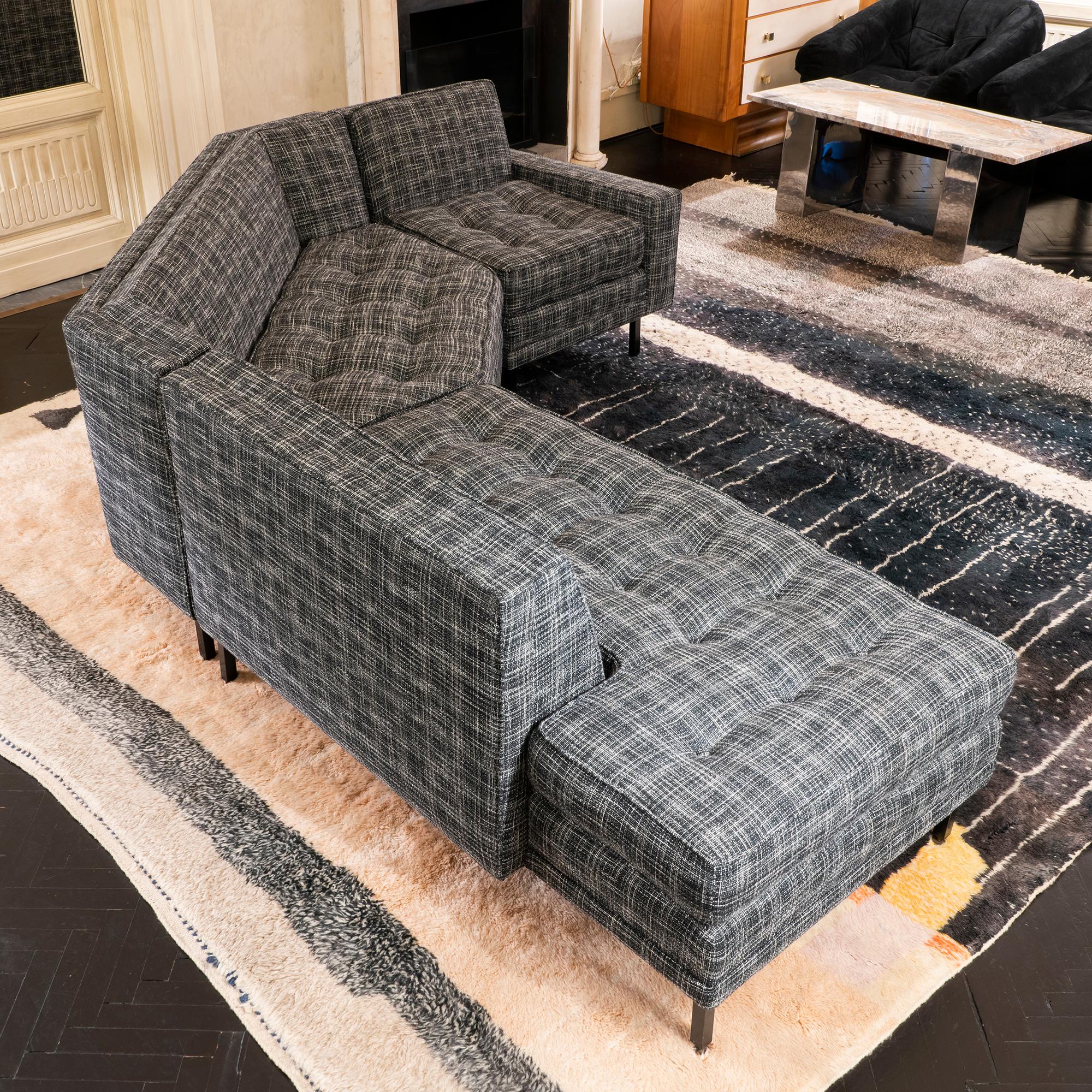 Three pieces modular sofa newly reupholstered in black and white bouclè fabric, black steel adjustable feets, perfect condition and vintage patina.
    