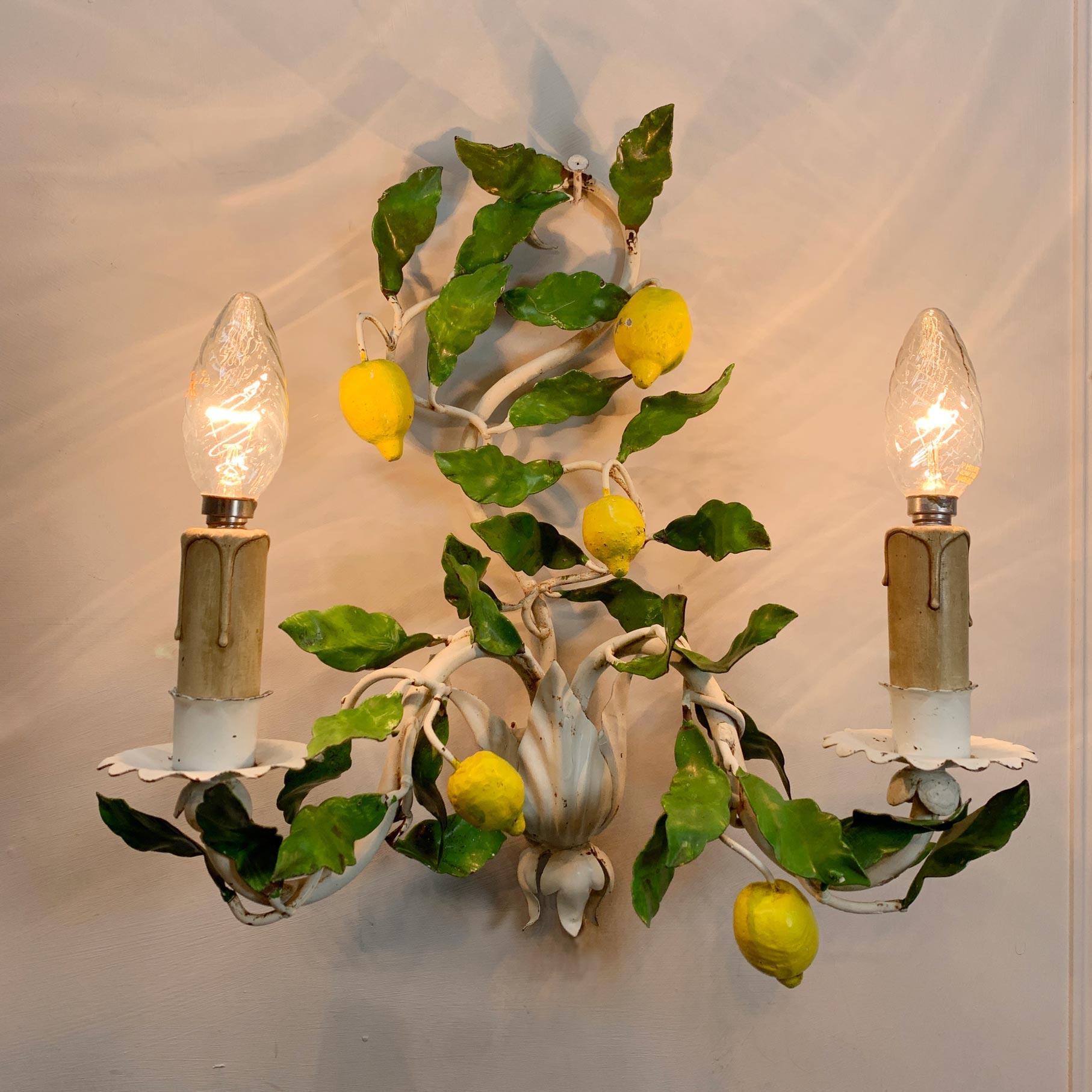 A single hand painted Italian Lemon fruit and leaf toleware wall light. In superb vintage condition, dating from the 1950's. 
The light is in full working order and PAT Tested
The light has two E14 (small screw in) lamp holders

Height 37cm, Width