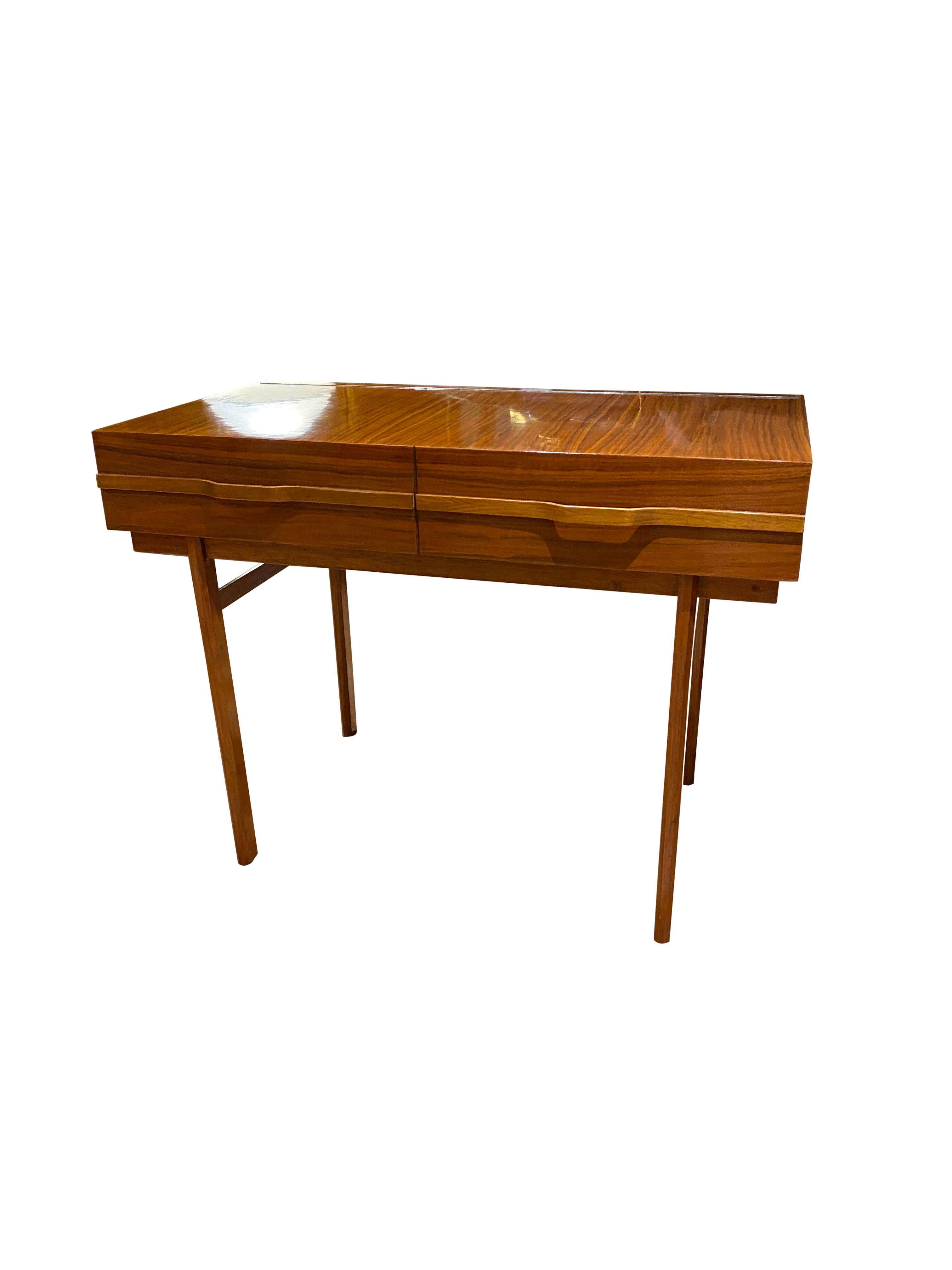 An Italian 1950’s openable desk and vanity table in blonde walnut with mirror and light.



 