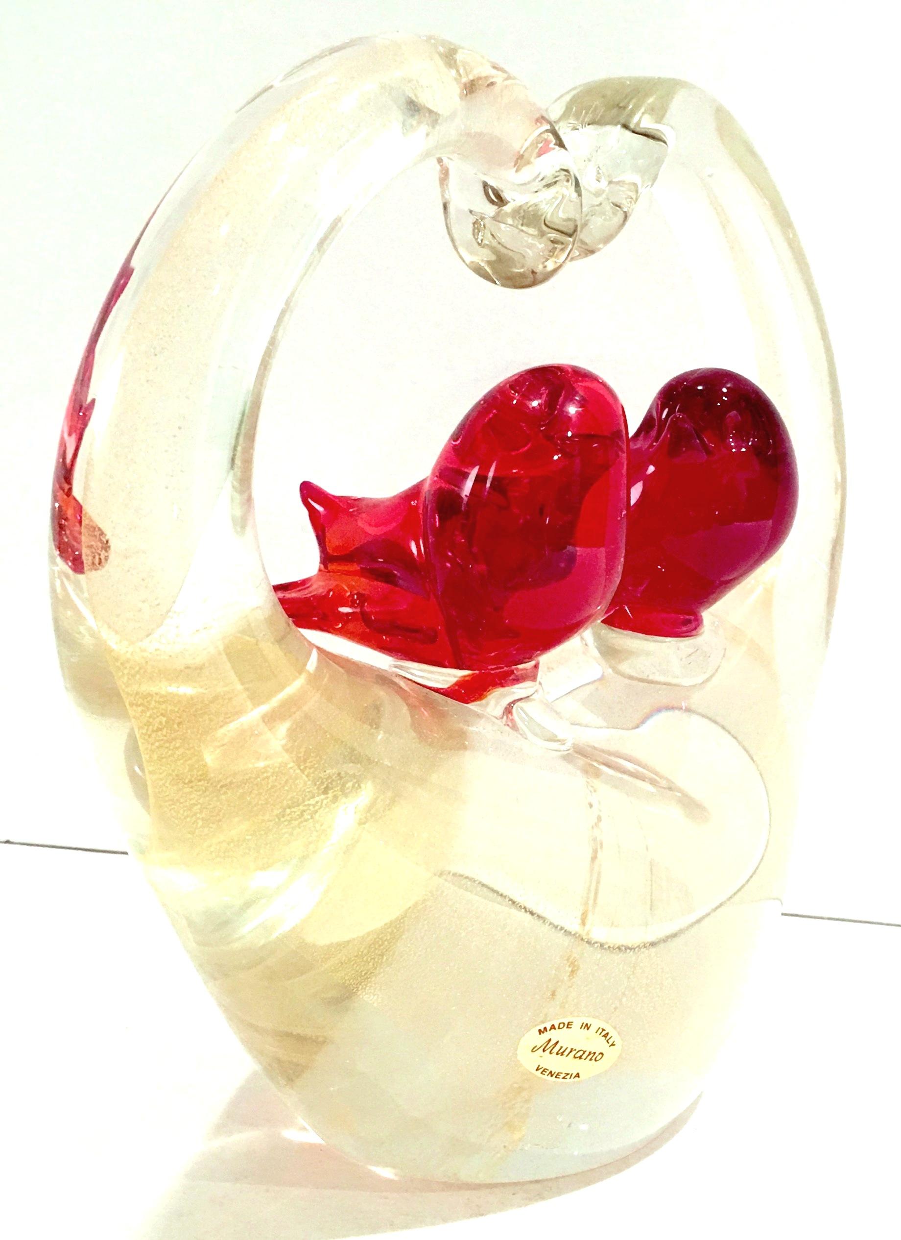 Mid-Century Italian Murano Glass Ruby & Gold Fleck Pair Of Love Birds Sculpture. Features a pair of vivid ruby red Murano glass love birds perched on clear and gold infused (Gold Aventurine) heart perch sculpture. Original manufacturer sticker in