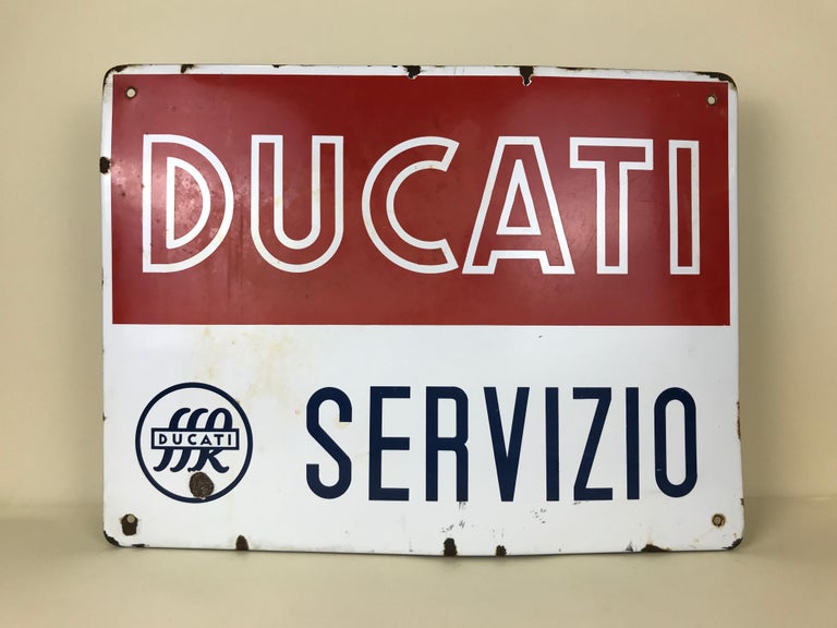 1950s Italian Vintage Rectangular Metal Enamel Ducati Bikes Advertising Sign In Good Condition For Sale In Milan, IT