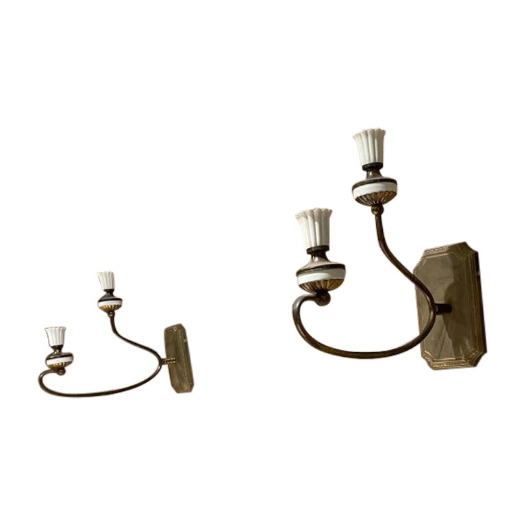 
Pareja de Apliques Escultóricos Italianos del Viejo Mundo 
Estilo de Gio Ponti años 50
Dos brazos cada candelabro.
Elegante placa de pared.
Sin etiqueta, atribuido al estilo de Gio Ponti Italia
13 d x 10,75 alto x 3,5 ancho
Estado original de