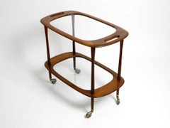 1950s Italian walnut and glass bar or serving cart by Cesare Lacca for Cassina