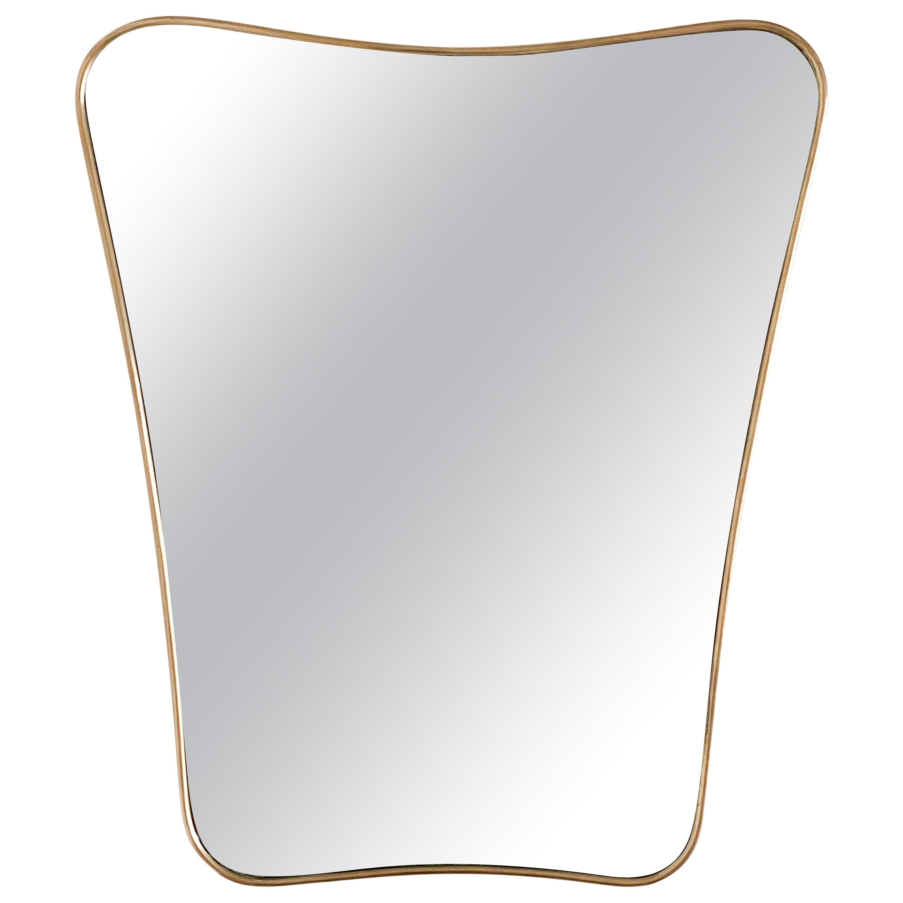 Vintage Italian mirror with wavy brass frame from the 1950s. Original brass finish with nice age and patina.