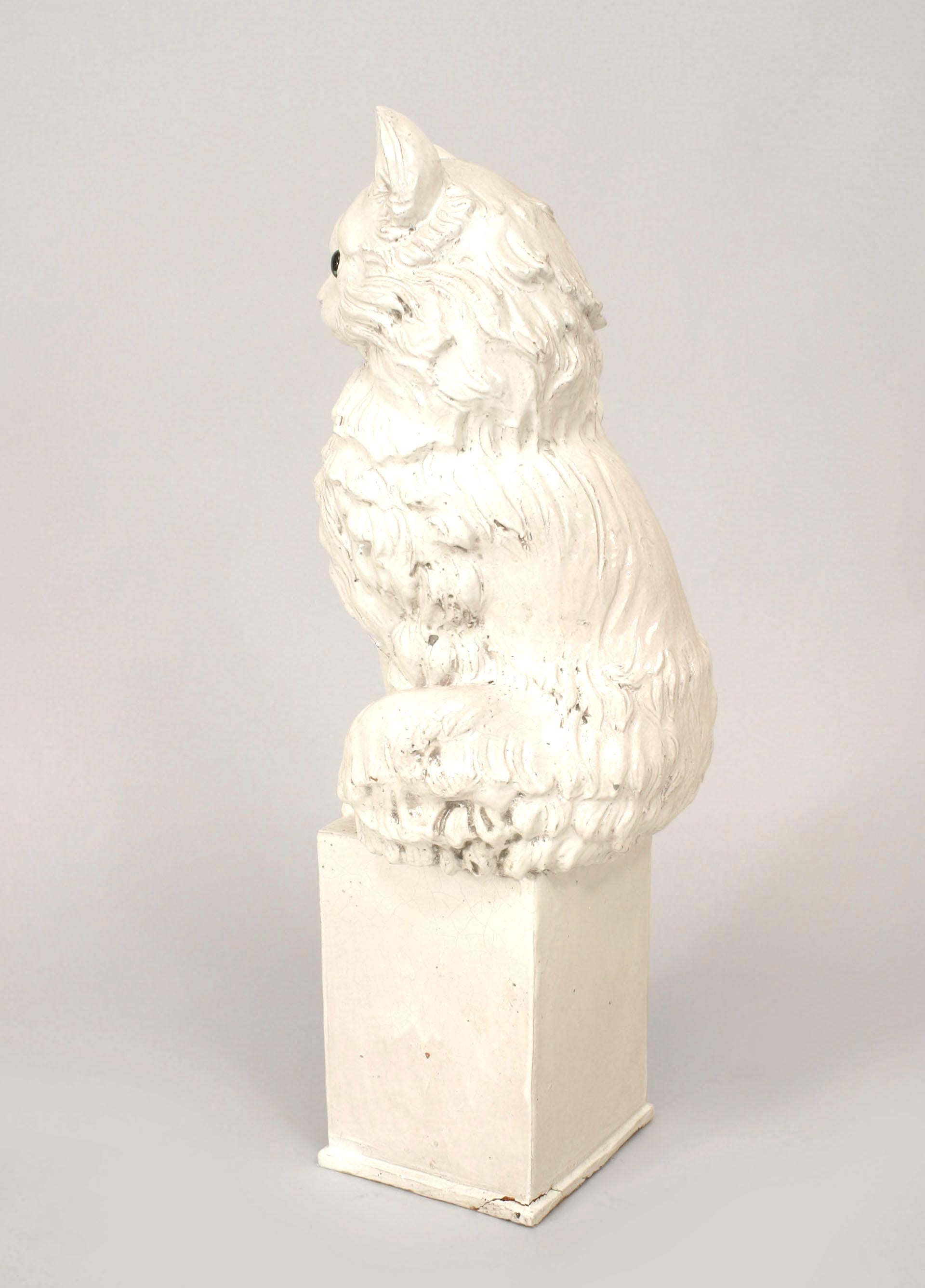white ceramic cat