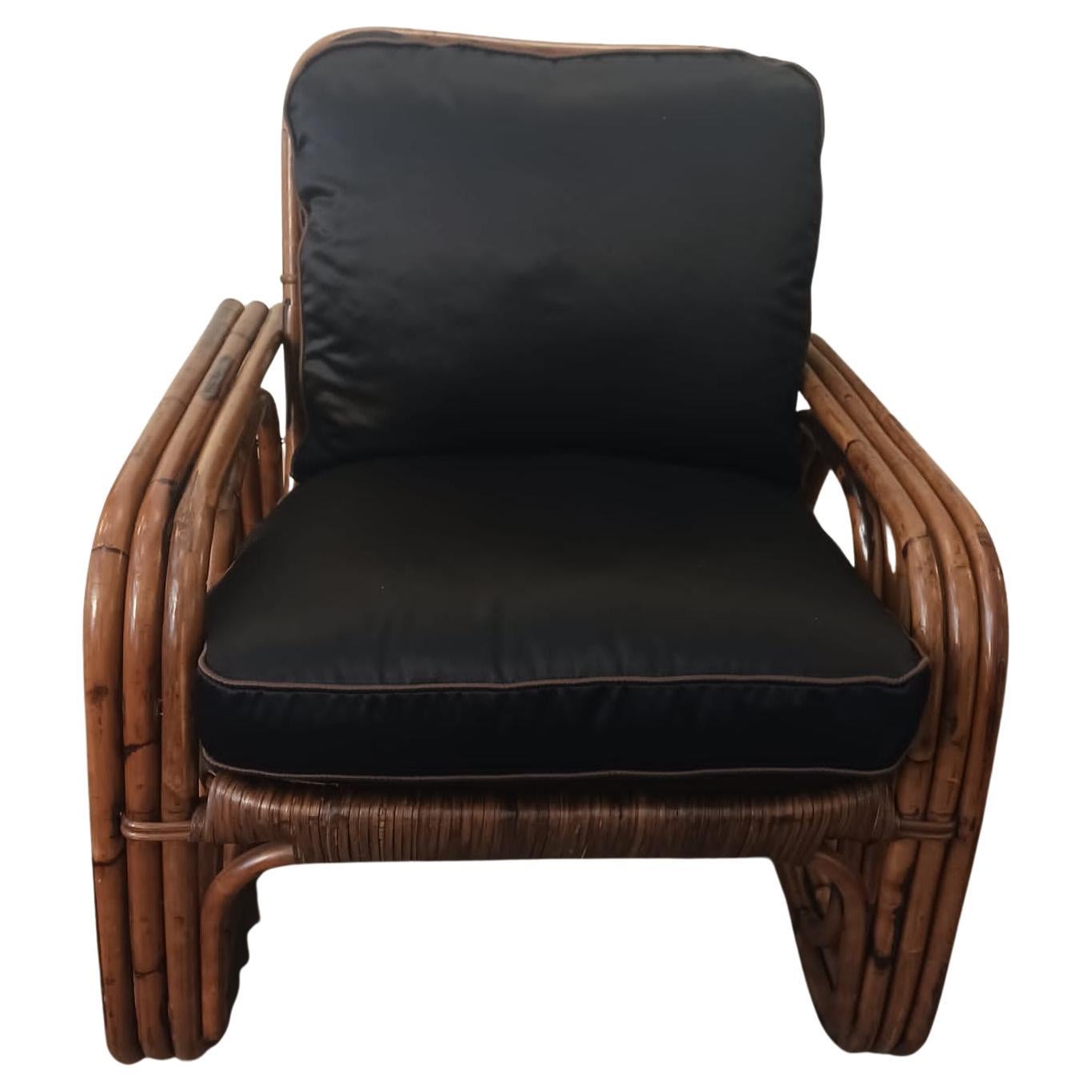 Bamboo armchairs from the 1950s from Italy by Bonacina.
New feather pillows and cotton covers. Black color and bronze edges. Conservative restoration. The price refers to the pair. Dimensions: cm 70x77 xh 80.