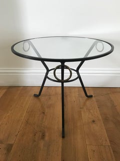 Guéridon Jacques Adnet des années 1950