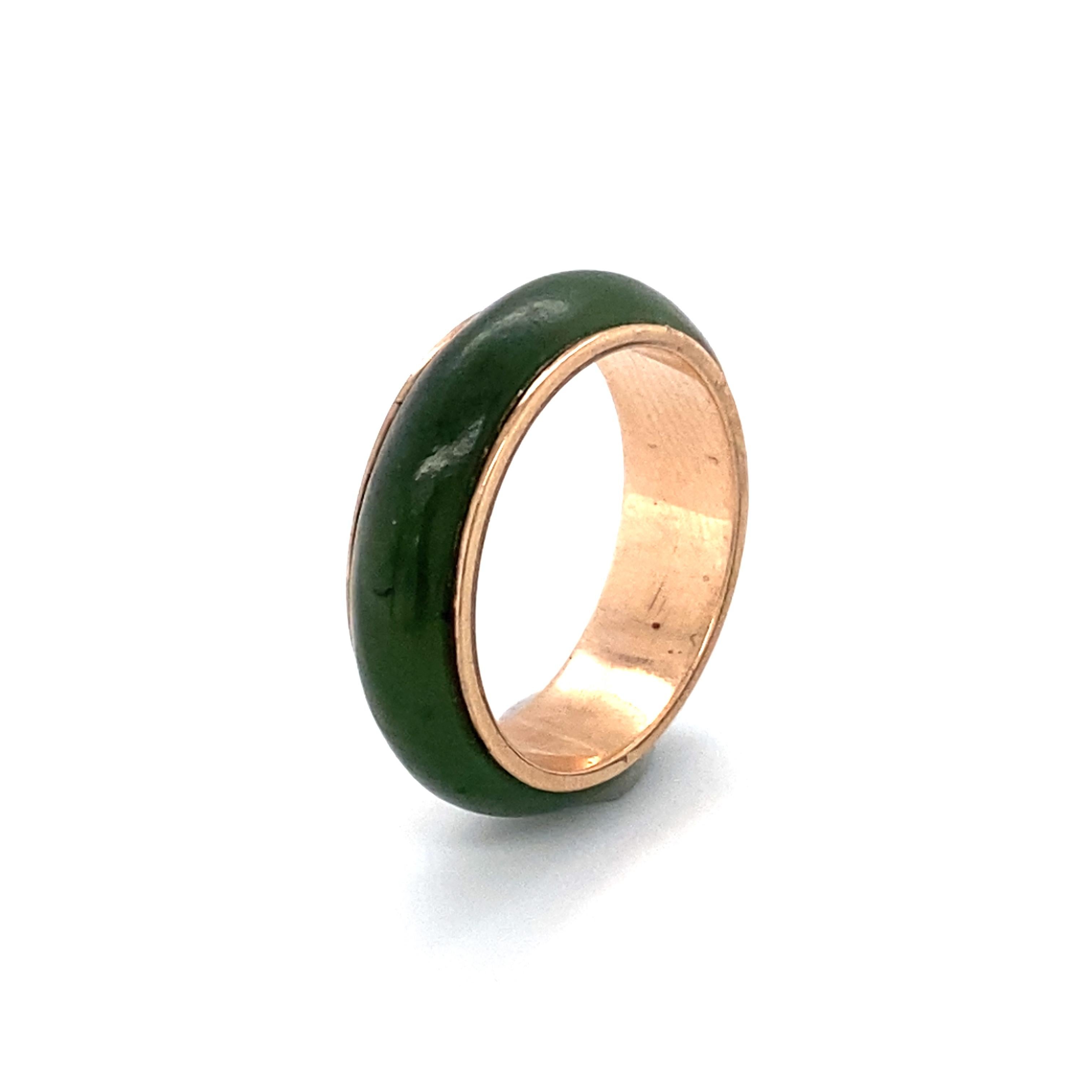 Item Details:
Gemstone: Jade
Metal type: 14 Karat Rose Gold 
Weight: 3.4grams 
Size: 6.75

Item Features:
Features one solid piece of Jade carved to fit around a 14 karat rose gold band ring. This ring is a perfect example of simple yet elegant.