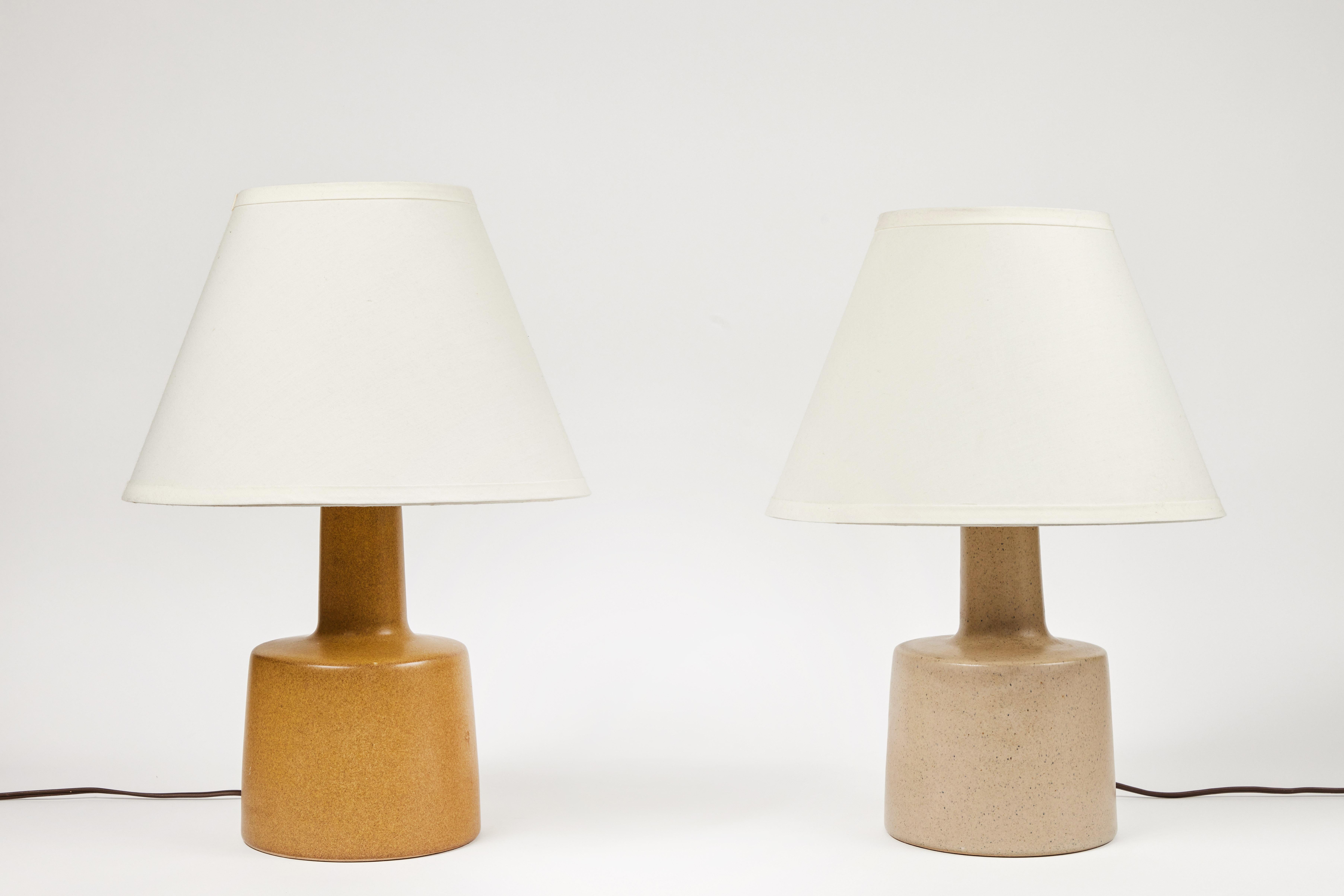 1950s Jane & Gordon Martz table lamp for Marshal Studios. Executed in ceramic with newer shades. Produced by Marshall Studios, Indianapolis, circa 1950s. An iconic example of midcentury Americana at its most refined. Signature in ceramic and both