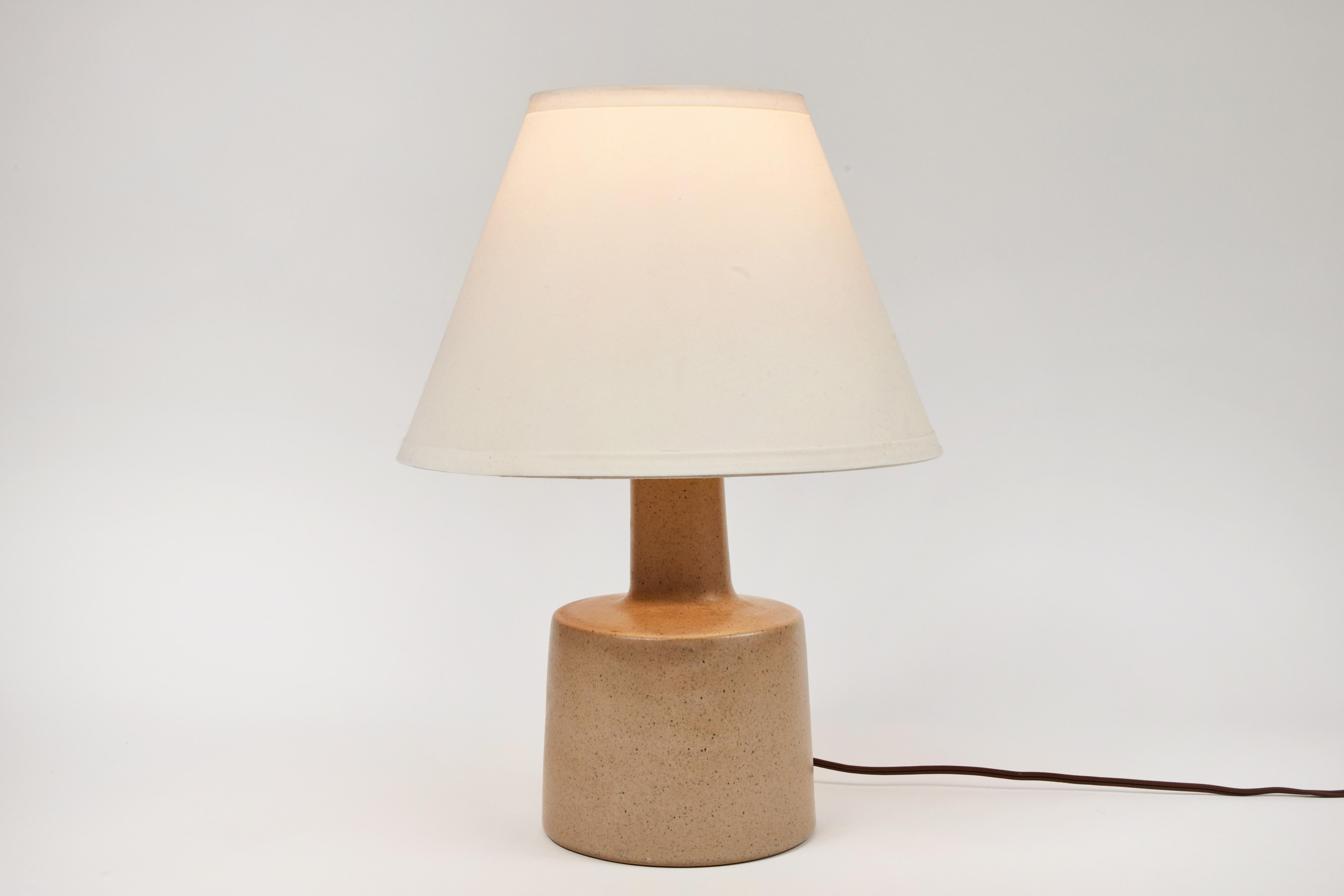 1950s Jane & Gordon Martz table lamp for Marshal Studios. Executed in ceramic with newer shades. Produced by Marshall Studios, Indianapolis, circa 1950s. An iconic example of midcentury Americana at its most refined. Signature in ceramic and both