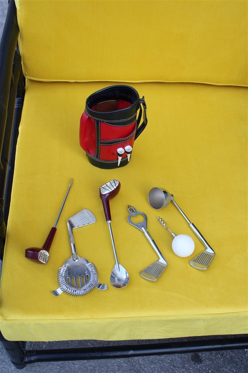 1950s Japan bar set with golf cues and 1950s backpack barware utensil.