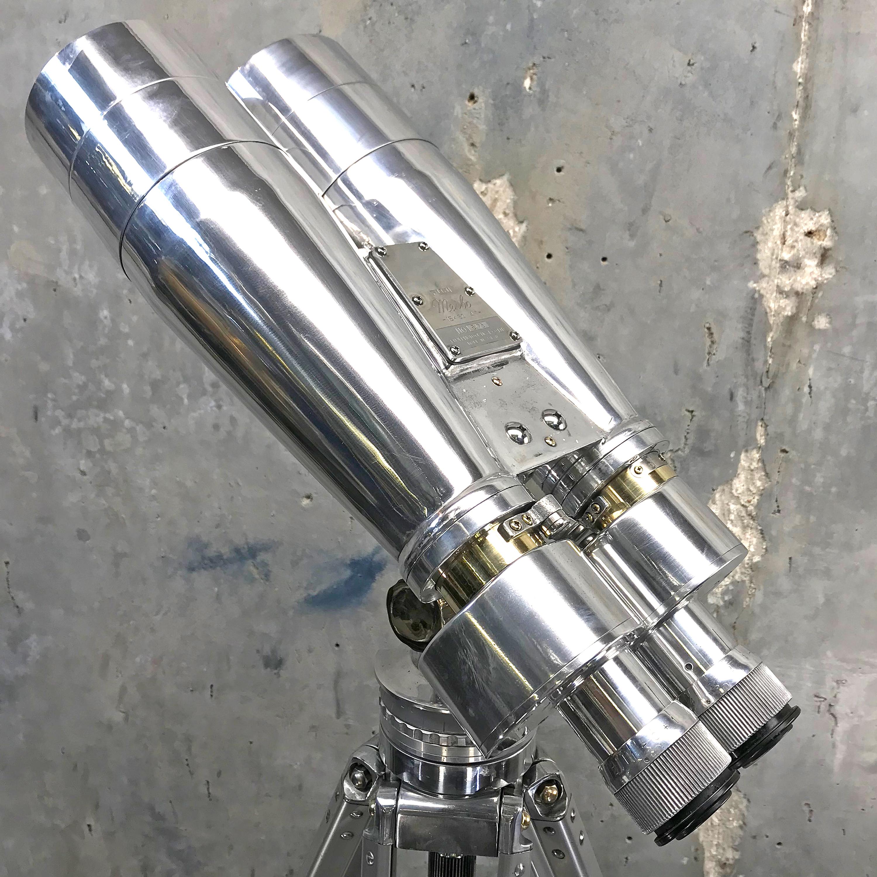 Japanese Observation Binoculars 15 x 80 - 4 degree field of view.

A large pair of Japanese ex-navy observation binoculars mounted on a vintage adjustable aluminium tripod. 

The tripod is manufactured by Bolux of Switzerland and are a sturdy