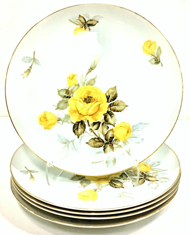 Mid-20th Century Japanese Porcelain & 22-K Gold dinnerware, set of twenty four pieces,
The pattern features a modern coupe shape with a bright white ground, yellow rose motif and 22-karat gold rim. Set includes, six salad/dessert plates, six fruit