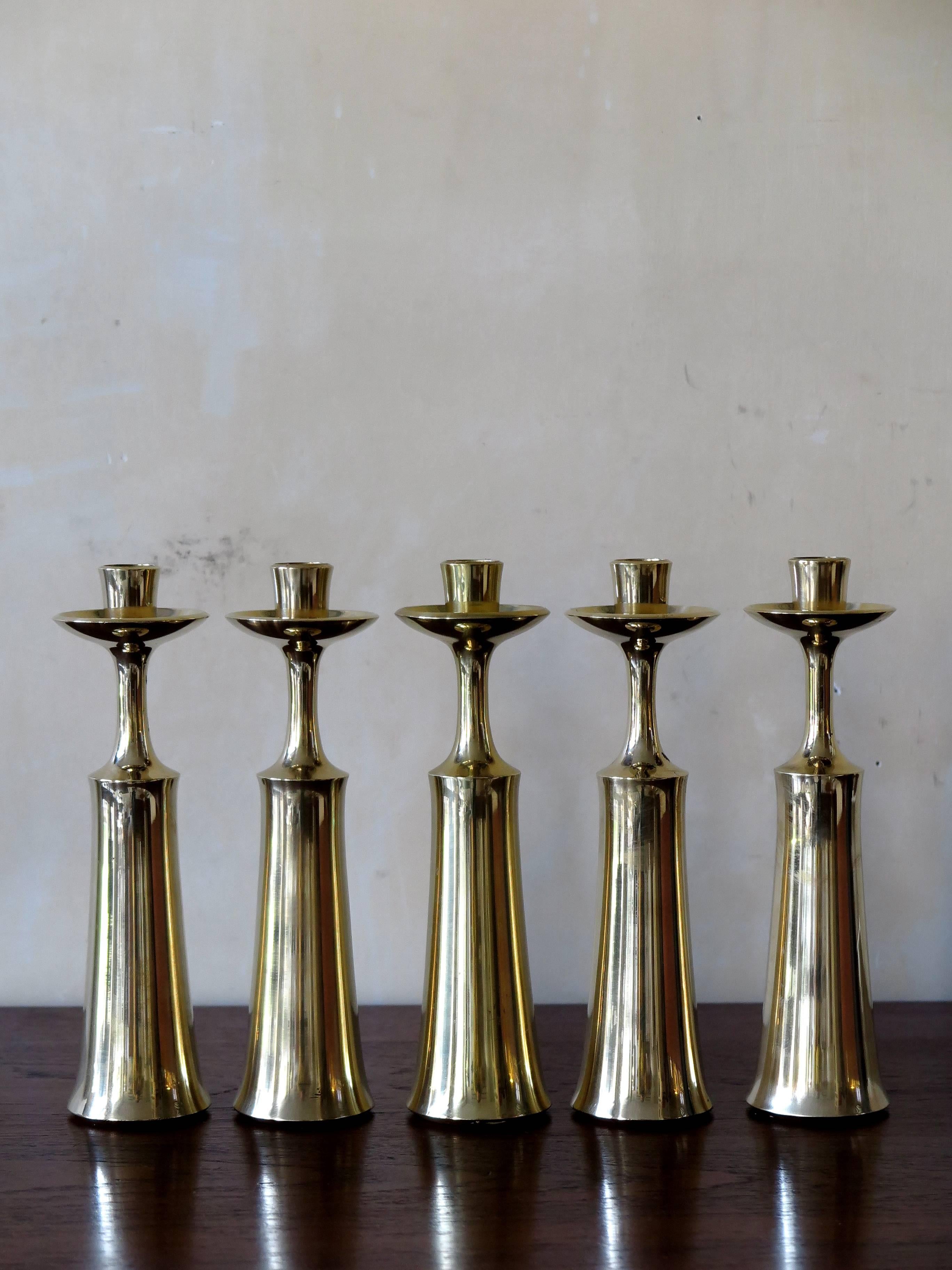 Set of brass Mid-Century Modern candlesticks designed by Jens Harald Quistgaard for Dansk Design, Denmark, circa 1950.