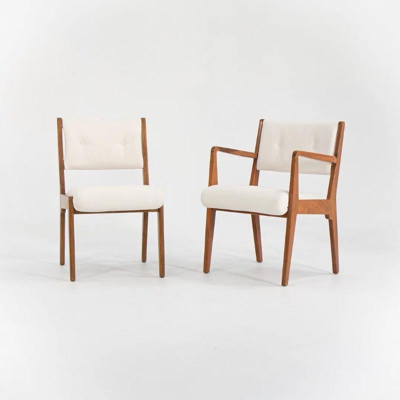 This is a set of six C 106 and C 206 dining chairs designed by Jens Risom and produced by Jens Risom Design Inc. circa late 1950s. These are gorgeous original examples in walnut, which have just been freshly reupholstered in off-white Knoll Textiles