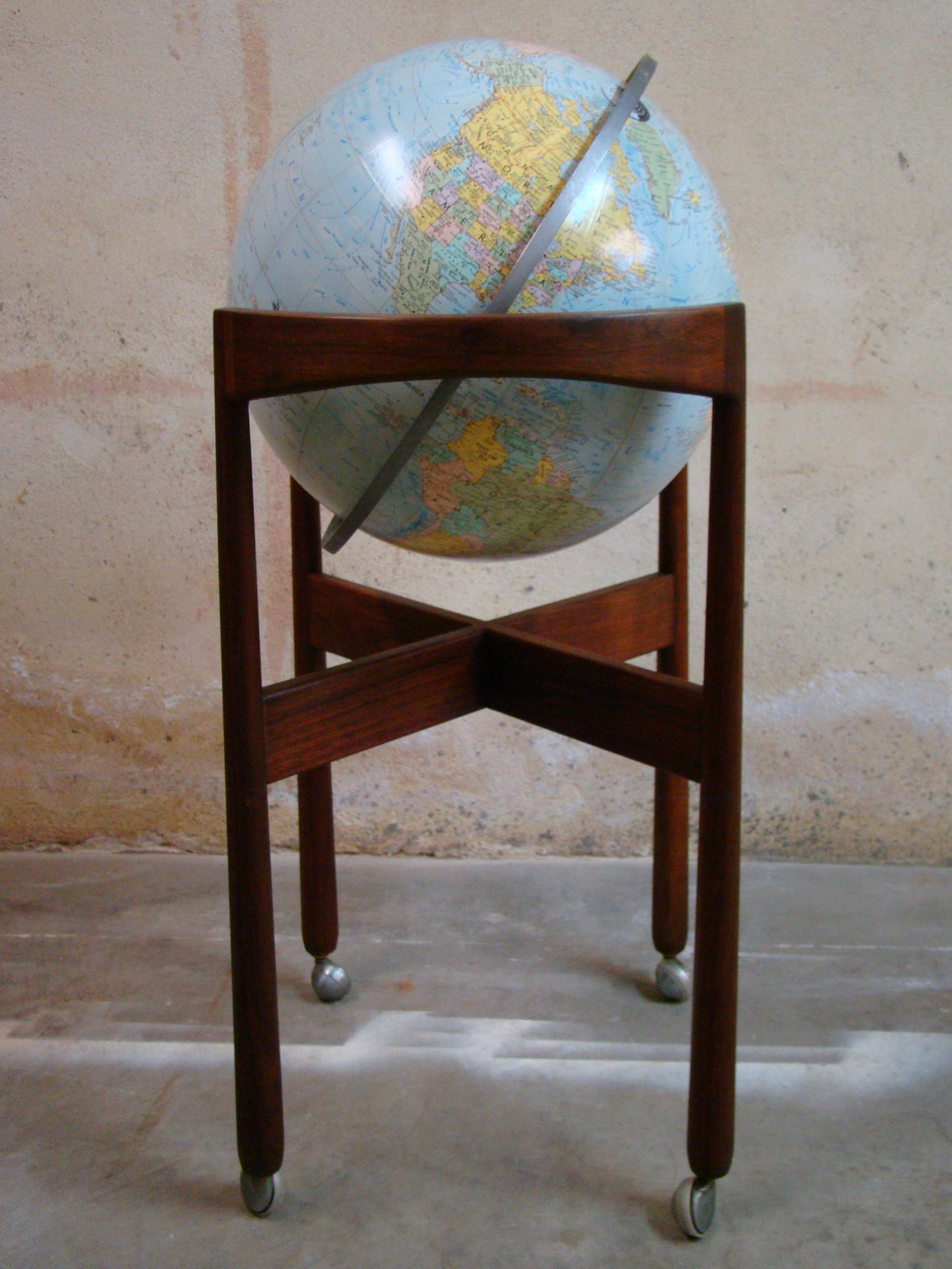 Designed by Jens Risom and manufactured by JRD circa 1956 this sculptured walnut 