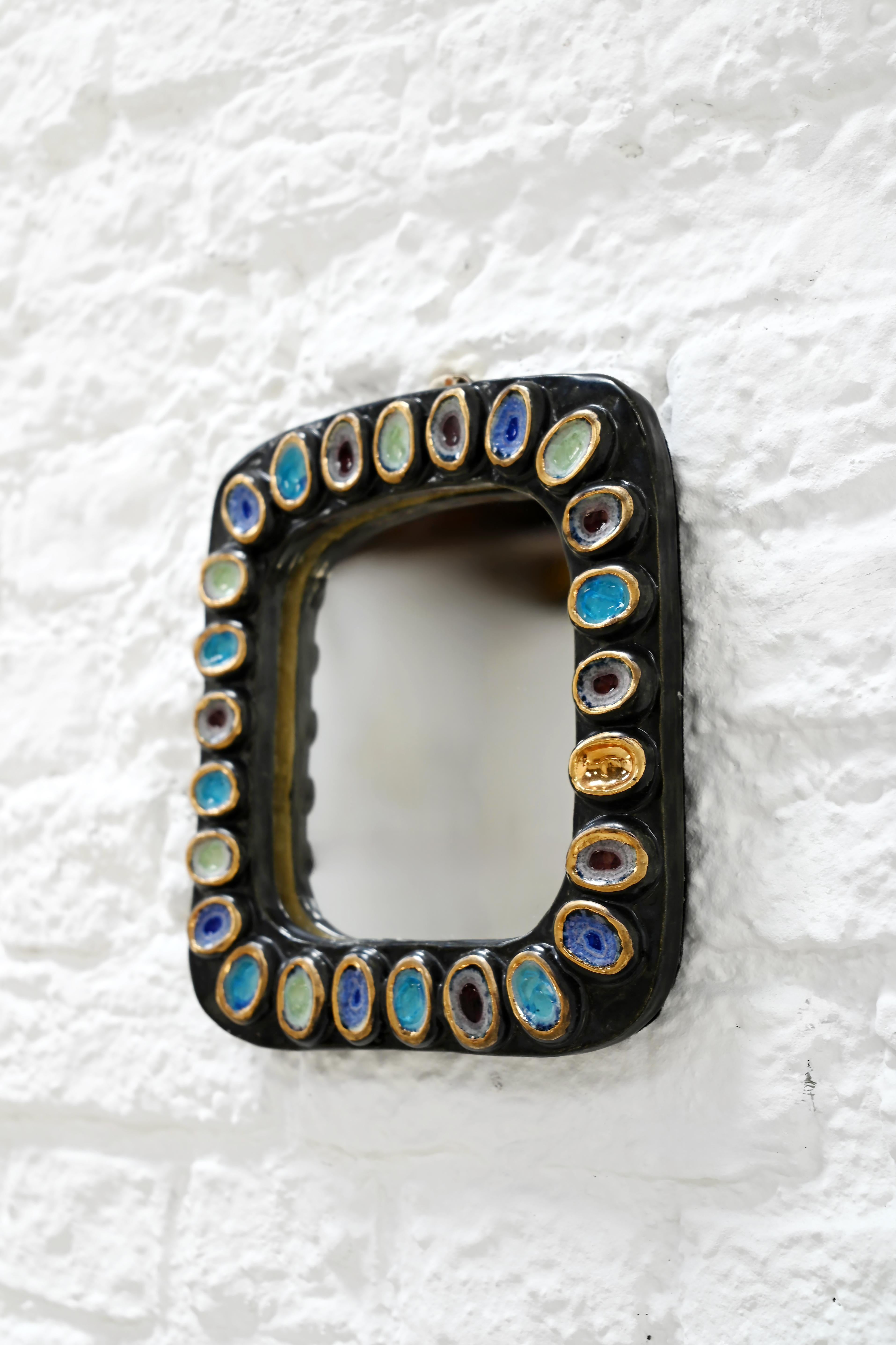 Mid-Century Modern Miroir en céramique de couleur Jewell des années 1950 attribué à Mithé Espelt en vente