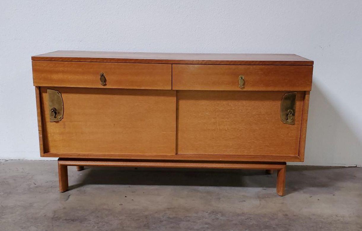 1950s John Keal petite buffet for brown Saltman Philippine mahogany credenza
john Keal Philippine mahogany wooden petite buffet.
This rarely seen john Keal for brown Saltman Philippine mahogany wooden sideboard has the painters pallet label as