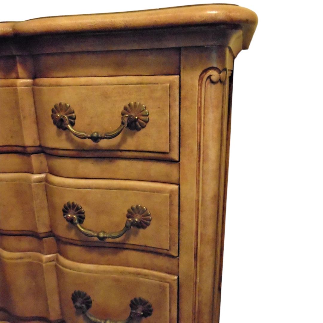 Formal French Country style; perfect size for a bedroom or a dressing room; signature John Widdicomb painted finish with gently antiqued hardware; wonderful carved detail; 7 drawers (each full width)