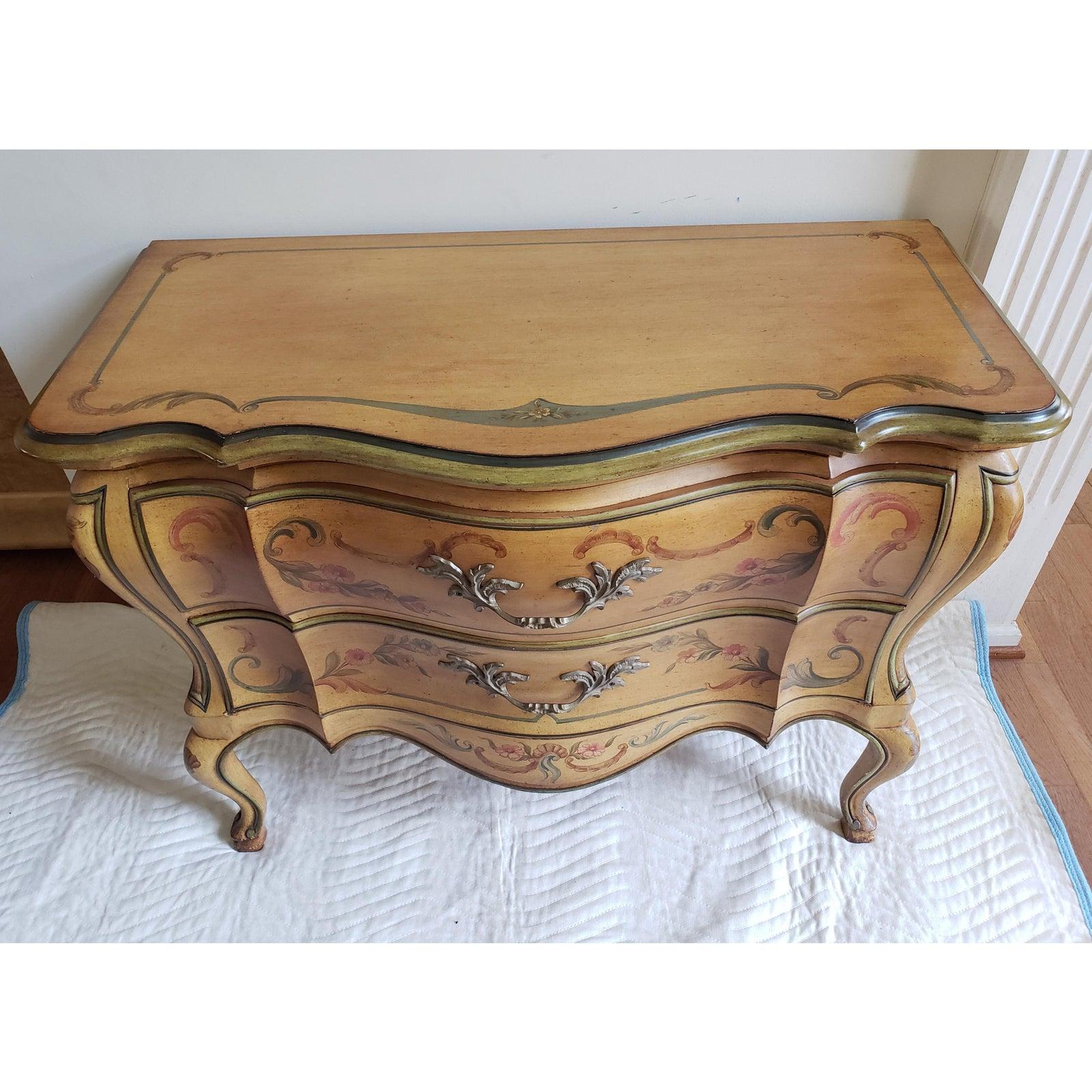 John Widdicomb Louis XV Style Bombe hand painted commode.
Approximate measurements are 40W x 19D x 31.25H.