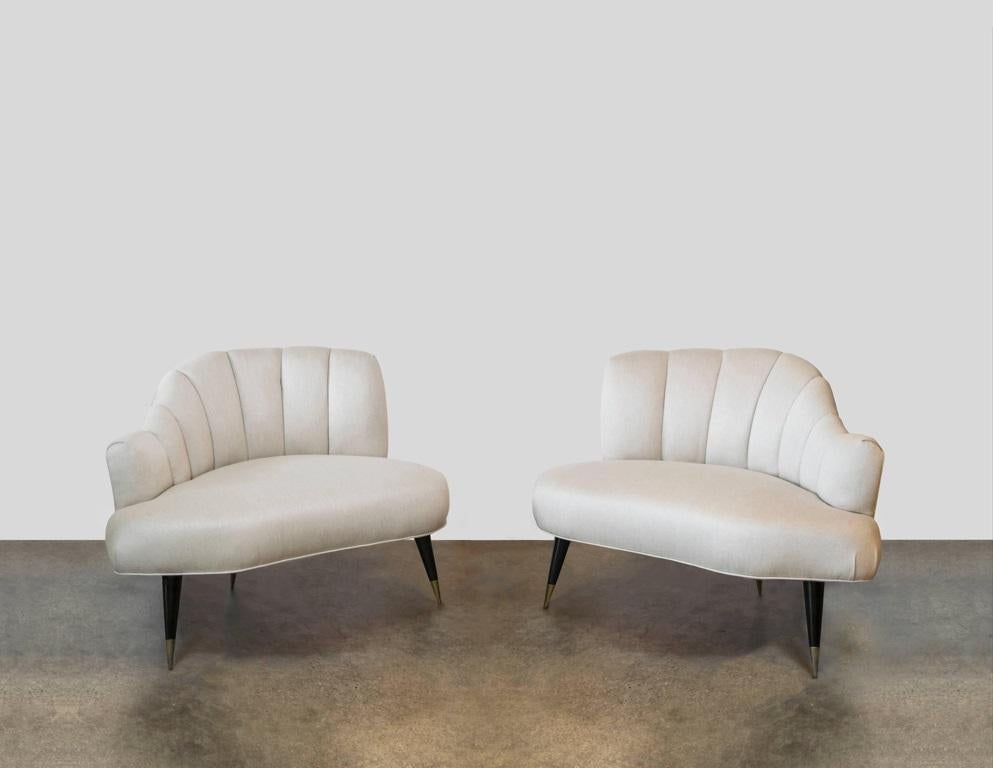 Indulge in the allure of Hollywood regency sophistication with this impeccably restored pair of rare sculptural chairs by Karpen of California, that were with the original owner since 1952. Recently recovered in a luxurious silk linen, the chairs