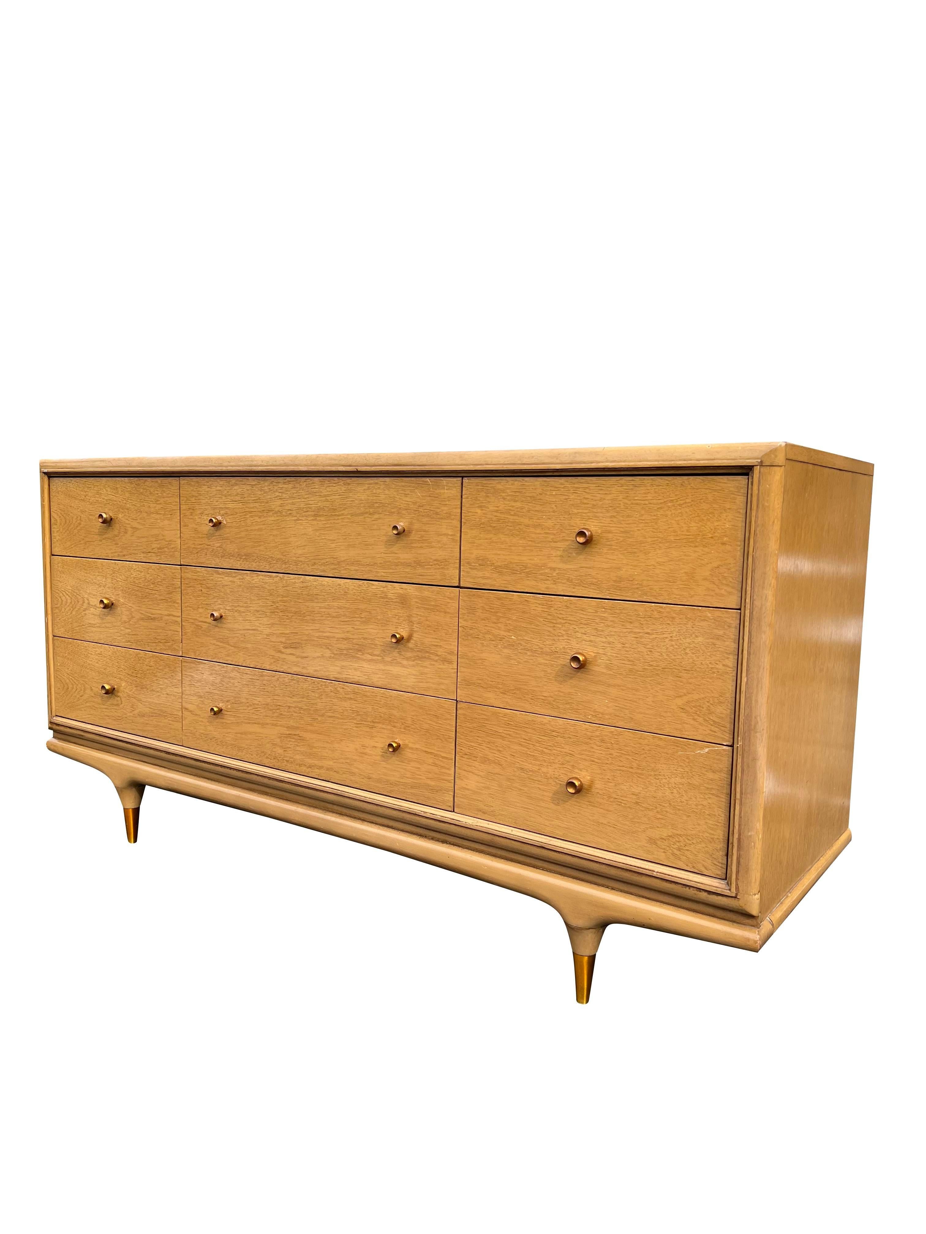 Vintage Kent Coffey Continental Long Dresser

This vintage dresser is a must-have for anyone looking to add a touch of retro style and elegance to their home. The unique design and high-quality materials make it a valuable and stylish piece that