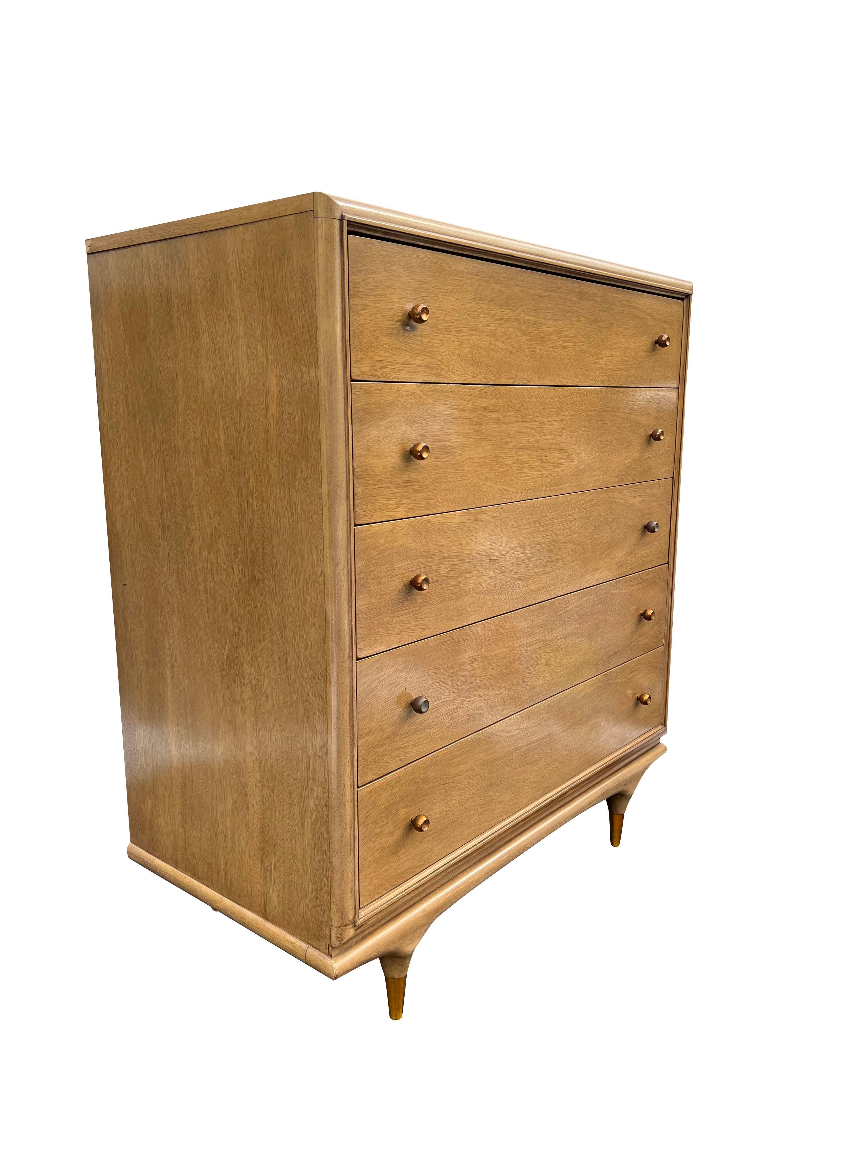 Vintage Kent Coffey Continental Tall Dresser

This vintage dresser is a must-have for anyone looking to add a touch of retro style and elegance to their home. The unique design and high-quality materials make it a valuable and stylish piece that