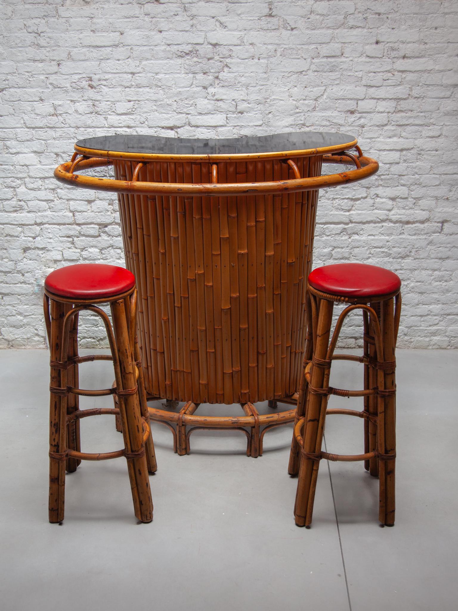 French 1950s Kidney Shaped Midcentury Rattan and Bamboo Tiki Bar with Two Stools