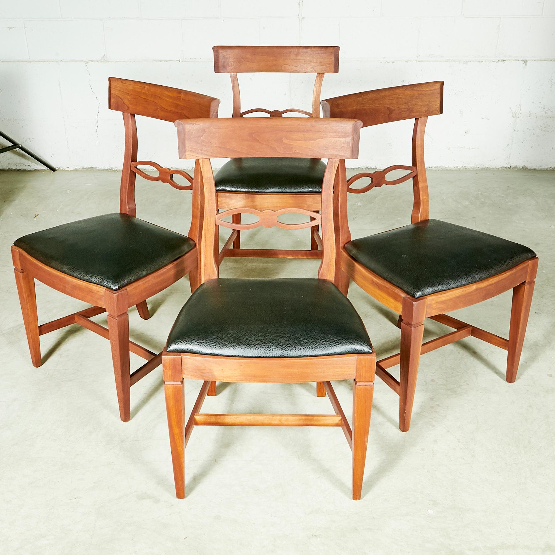 Vintage 1950s set of 4 Kindel Furniture Co cherrywood dining room chairs in newly refinished condition and new black Naugahyde seats.