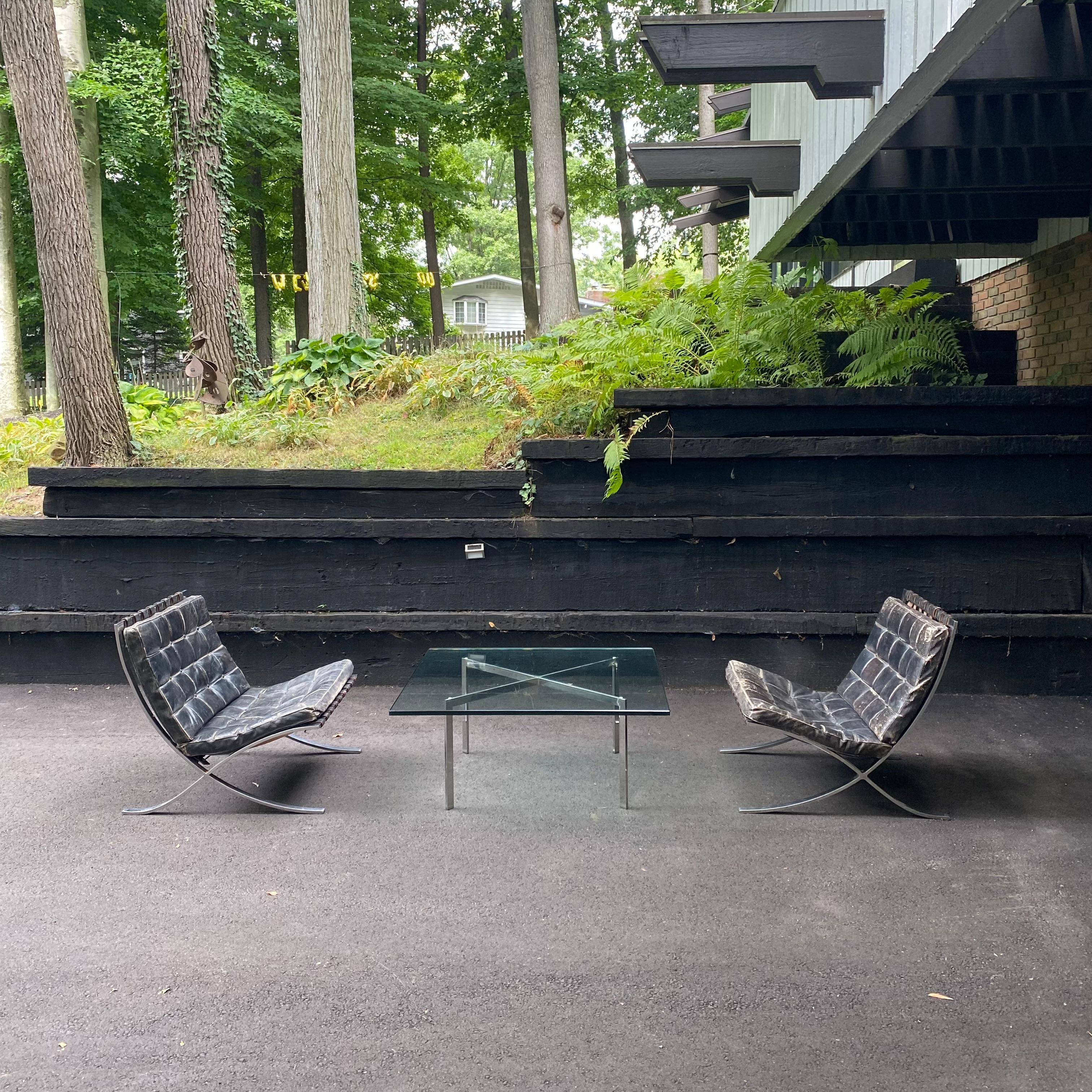 1950’s Authentic Knoll Barcelona pair of chairs and coffee table by Mies van der Rohe.

This is an exceptional pair of original authentic Barcelona chairs with matching coffee table designed by Ludwig Mies van der Rohe for his Barcelona Pavilion in