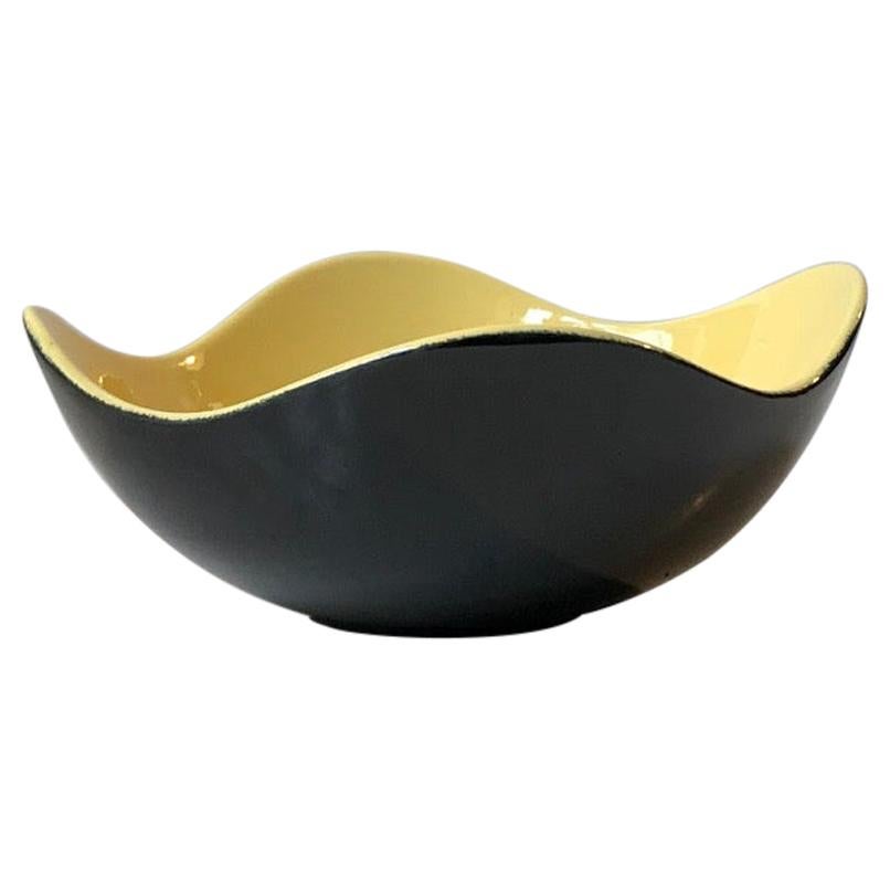 Bol en céramique Kronjyden « Congo » à glaçure noire et jaune des années 1950
