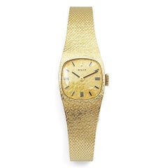 1950's Ladies Rolex Cocktail 17mm Solid 14K Yellow Gold Watch with Gold Dial.