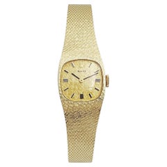 1950's Ladies Rolex Cocktail 17mm Solid 14K Yellow Gold Watch with Gold Dial.