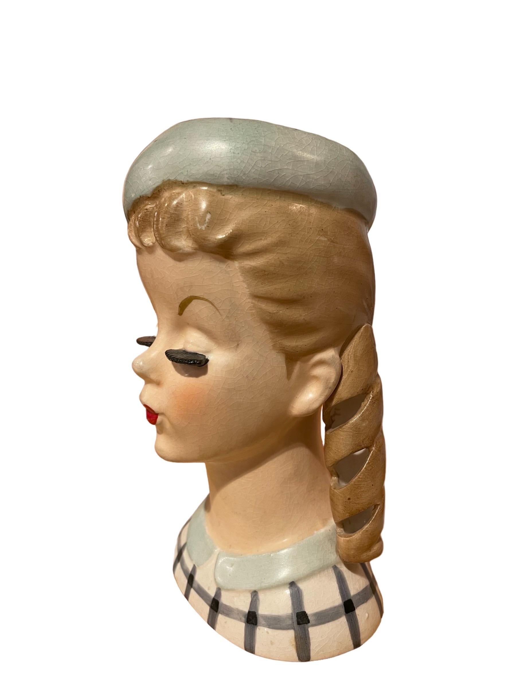 1950s Lady Head Vase with Banana Curls and Beret 

1950s Lady Head Vase with Banana Curls, Beret, Teal Peter Pan Collar, and Plaid Top 

Nippon Yoko Boeki Japan 
About 6” high, 4” length

In good vintage condition but not perfect, see photos and