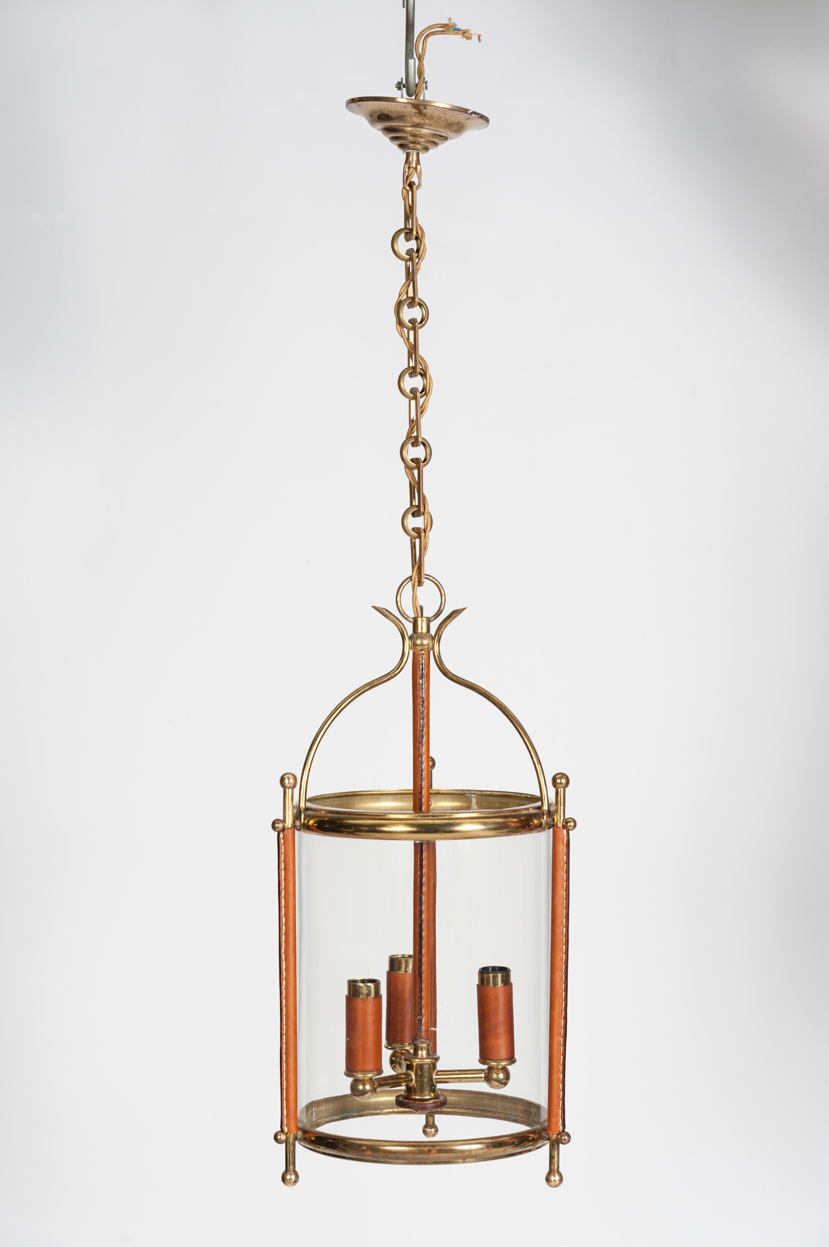 Stitched leather lantern
Measures: Diameter 25 cm high, 40 high with chain 80 cm.