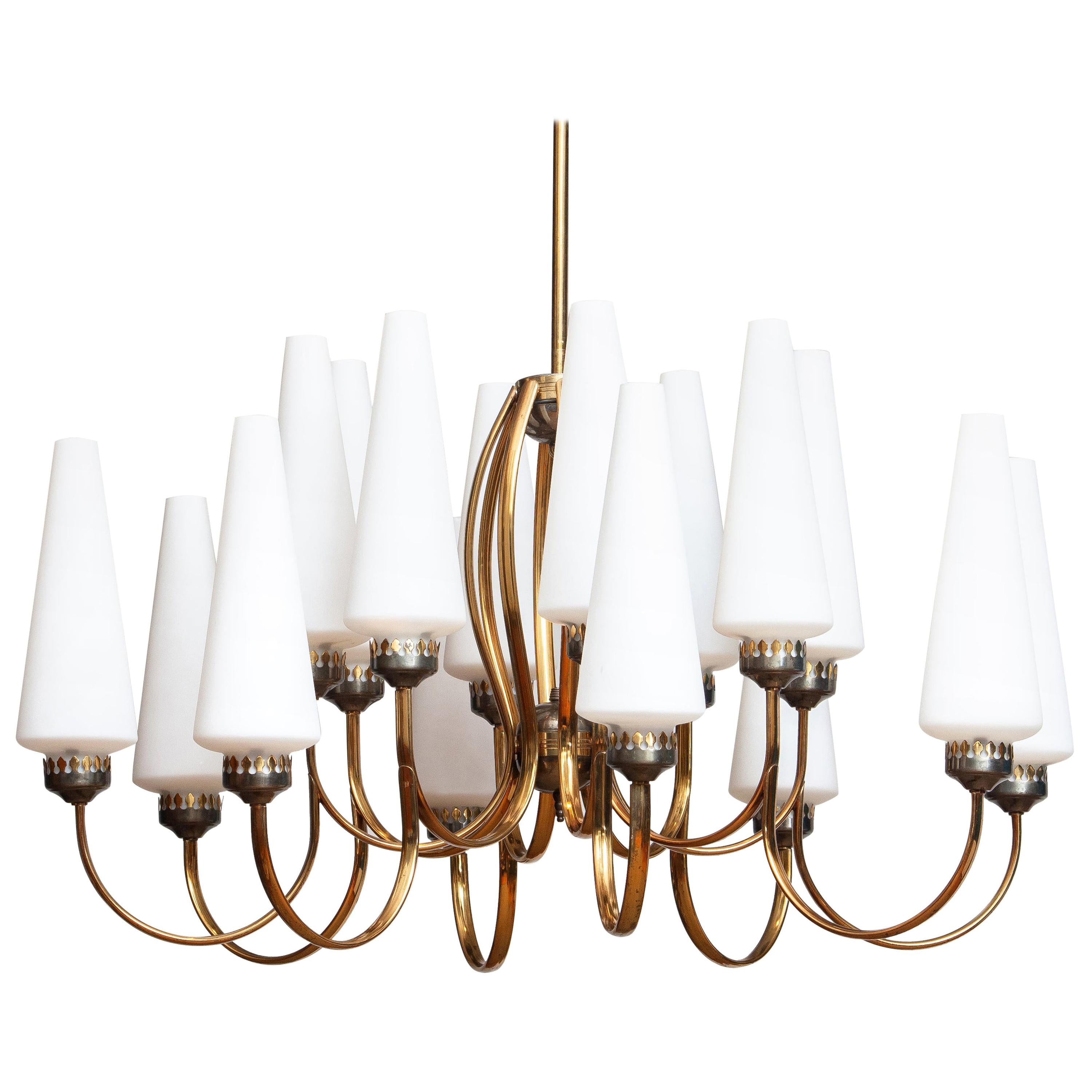 Exceptional big brass extra large chandelier with sixteen big Murano vases made by Stilnovo in the 1950s, Italy.
Measures: The diameter of these big chandelier is 90 cm or 36 inches.
The height of the Murano vases is 30 cm or 12 inches.
The total